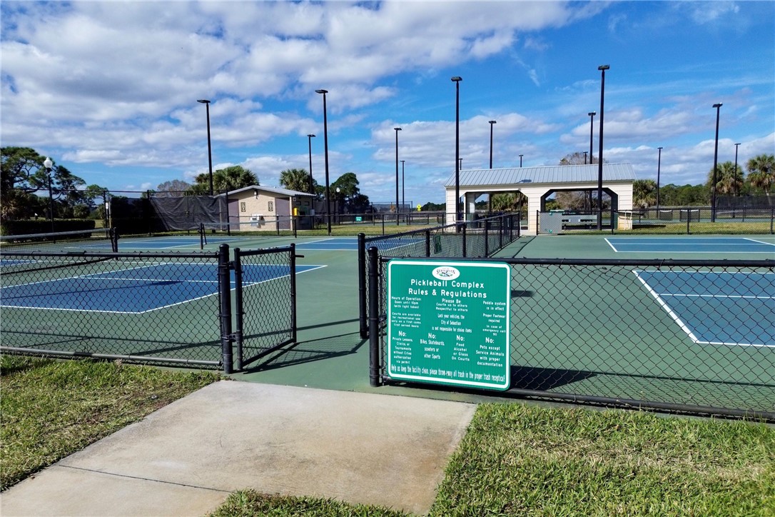 106 Tracy Drive Sebastian, FL 32958 - Photo 25 of 35 a view of a street with cars parked