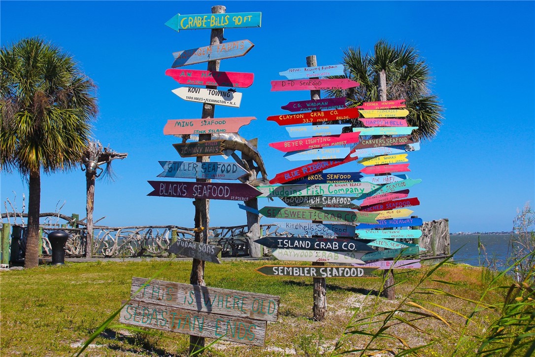 106 Tracy Drive Sebastian, FL 32958 - Photo 31 of 35 a front view of a house with swimming pool and sitting area