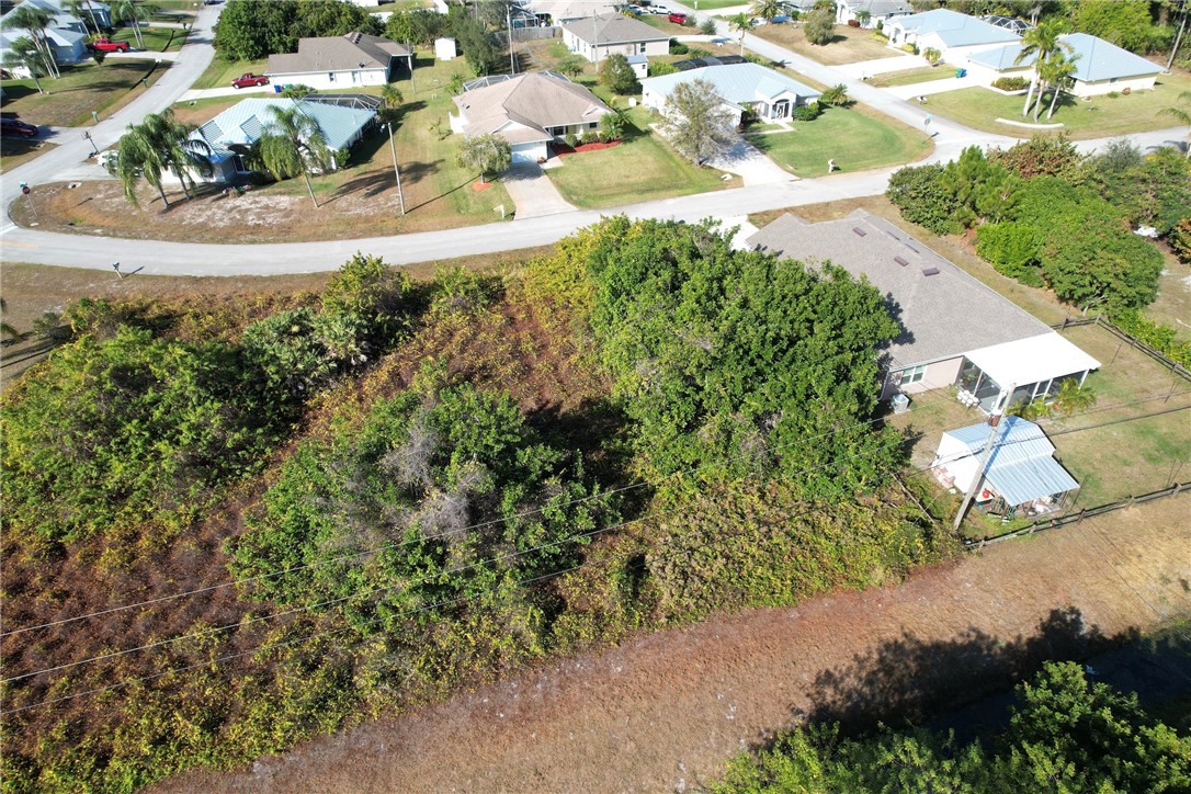 106 Tracy Drive Sebastian, FL 32958 - Photo 6 of 35 an aerial view of a houses with yard