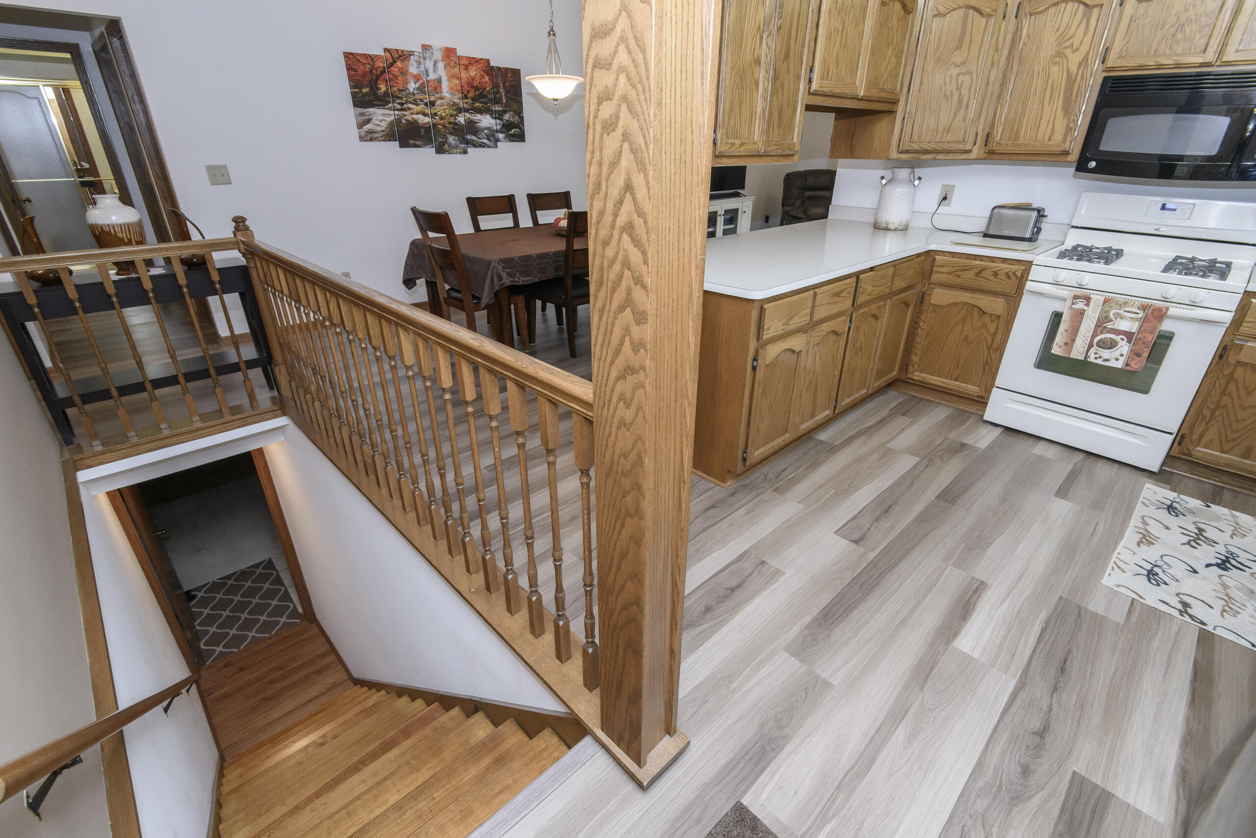 W178N9858 Riversbend Circle East, Unit D95 Germantown, WI 53022 - Photo 6 of 27 Recently refinished stairs