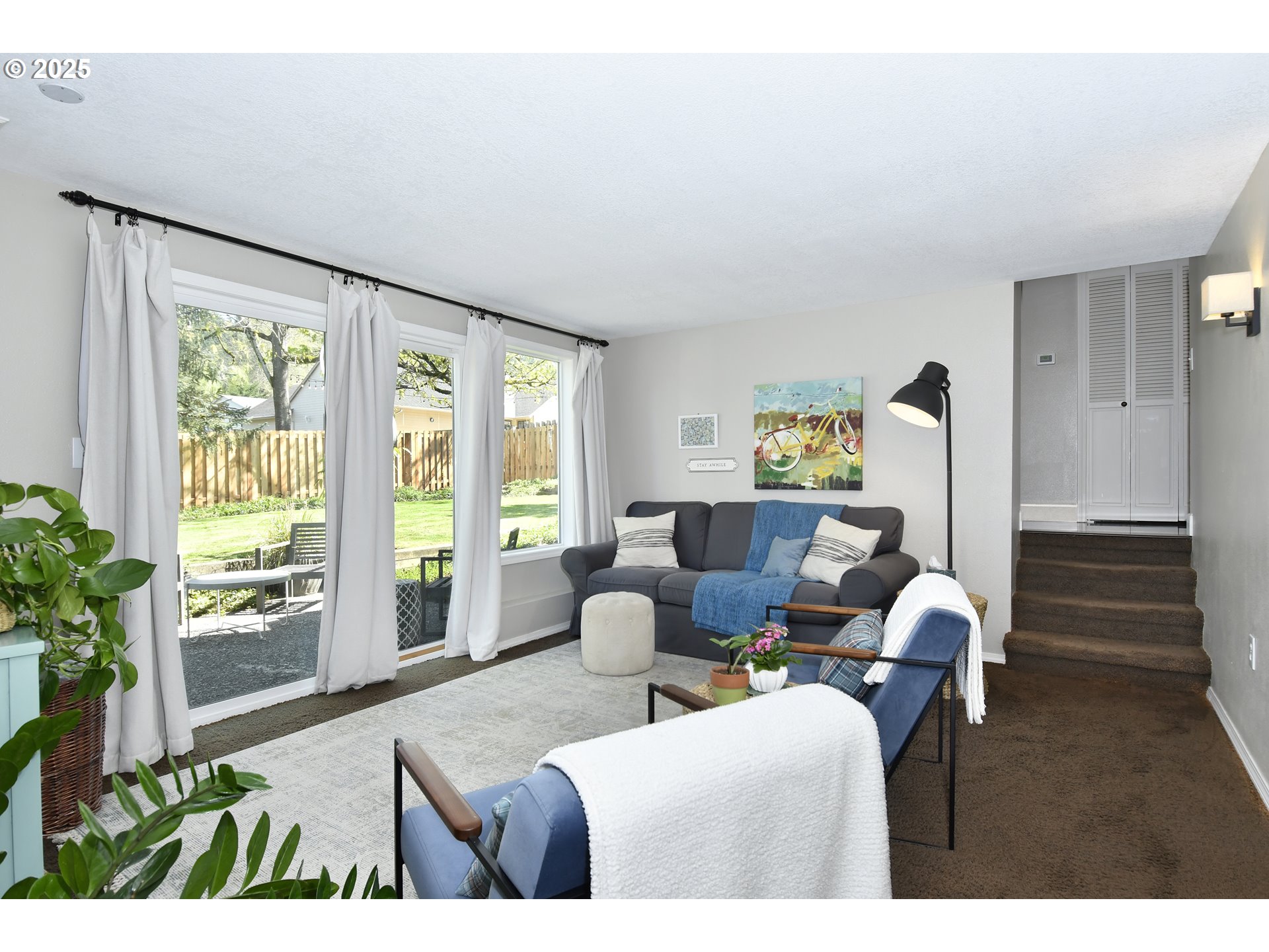 2430 Southwest Willowbrook Avenue Gresham, OR 97080 - Photo 16 of 33 a living room with furniture and a large window