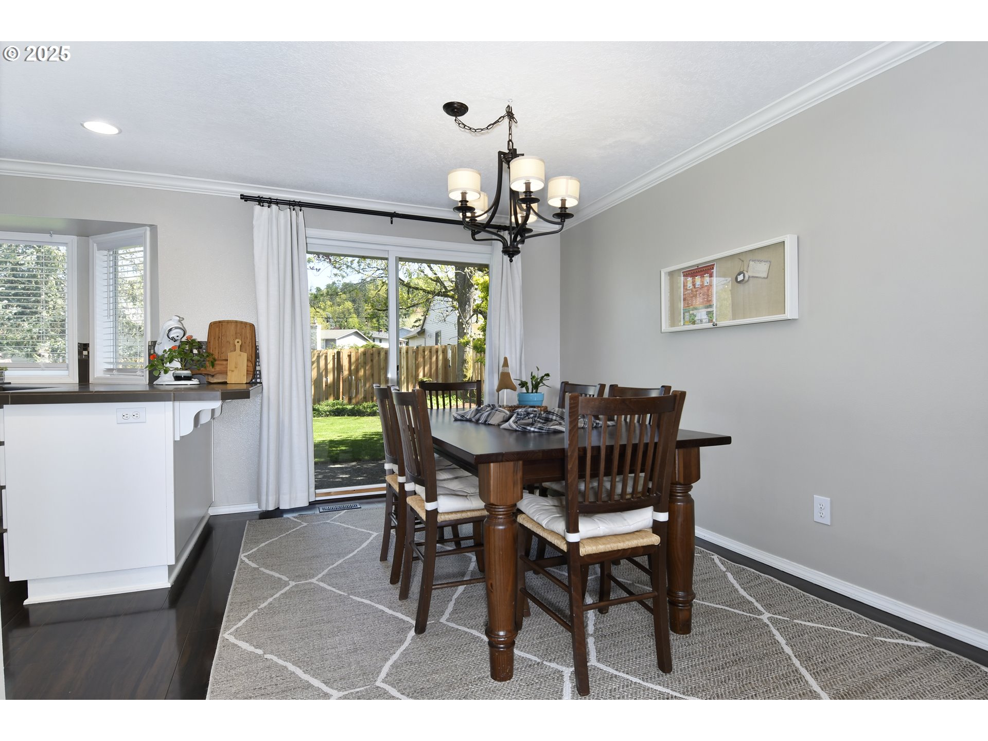 2430 Southwest Willowbrook Avenue Gresham, OR 97080 - Photo 9 of 33 a view of a dining room with furniture window and outside view