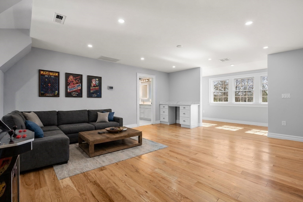 10 Hitching Post Lane Weston, MA 02493 - Photo 31 of 42 a living room with furniture and wooden floor