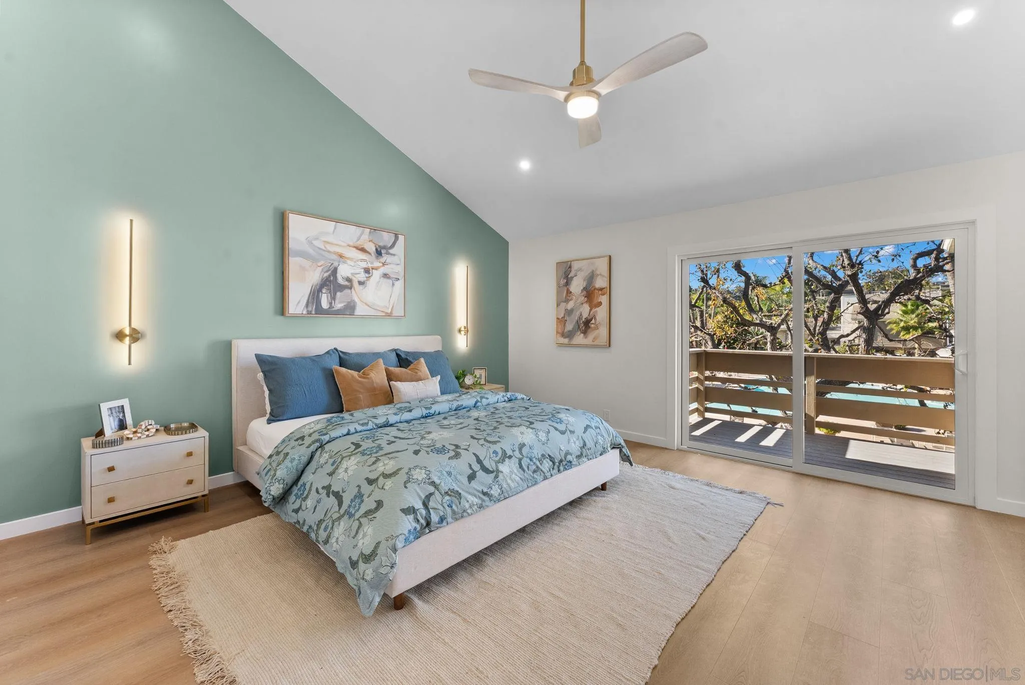 16048 Via Viajera Rancho Santa Fe, CA 92091 - Photo 18 of 46 a spacious bedroom with a large bed and a tv
