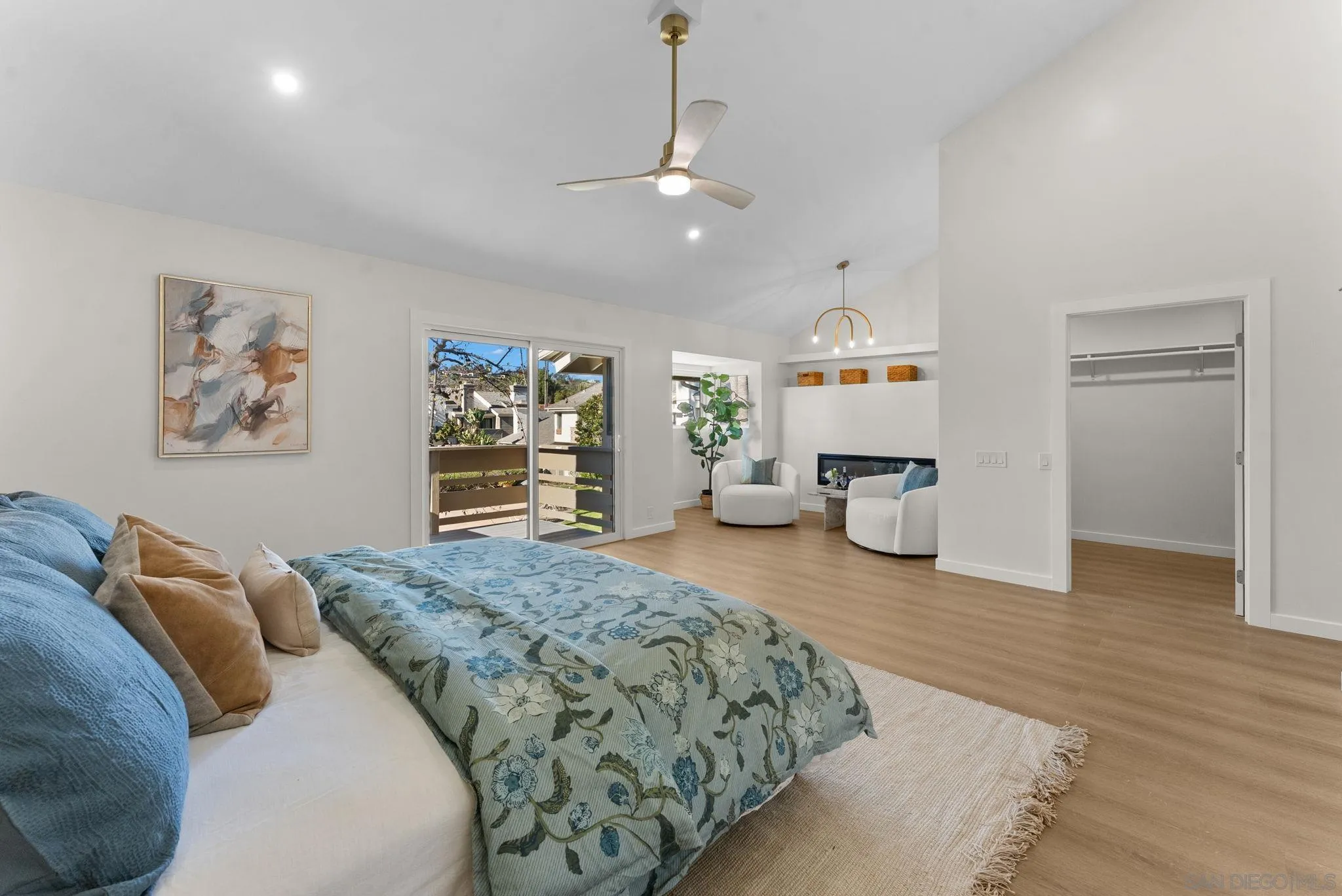 16048 Via Viajera Rancho Santa Fe, CA 92091 - Photo 20 of 46 a spacious bedroom with a bed and a dresser