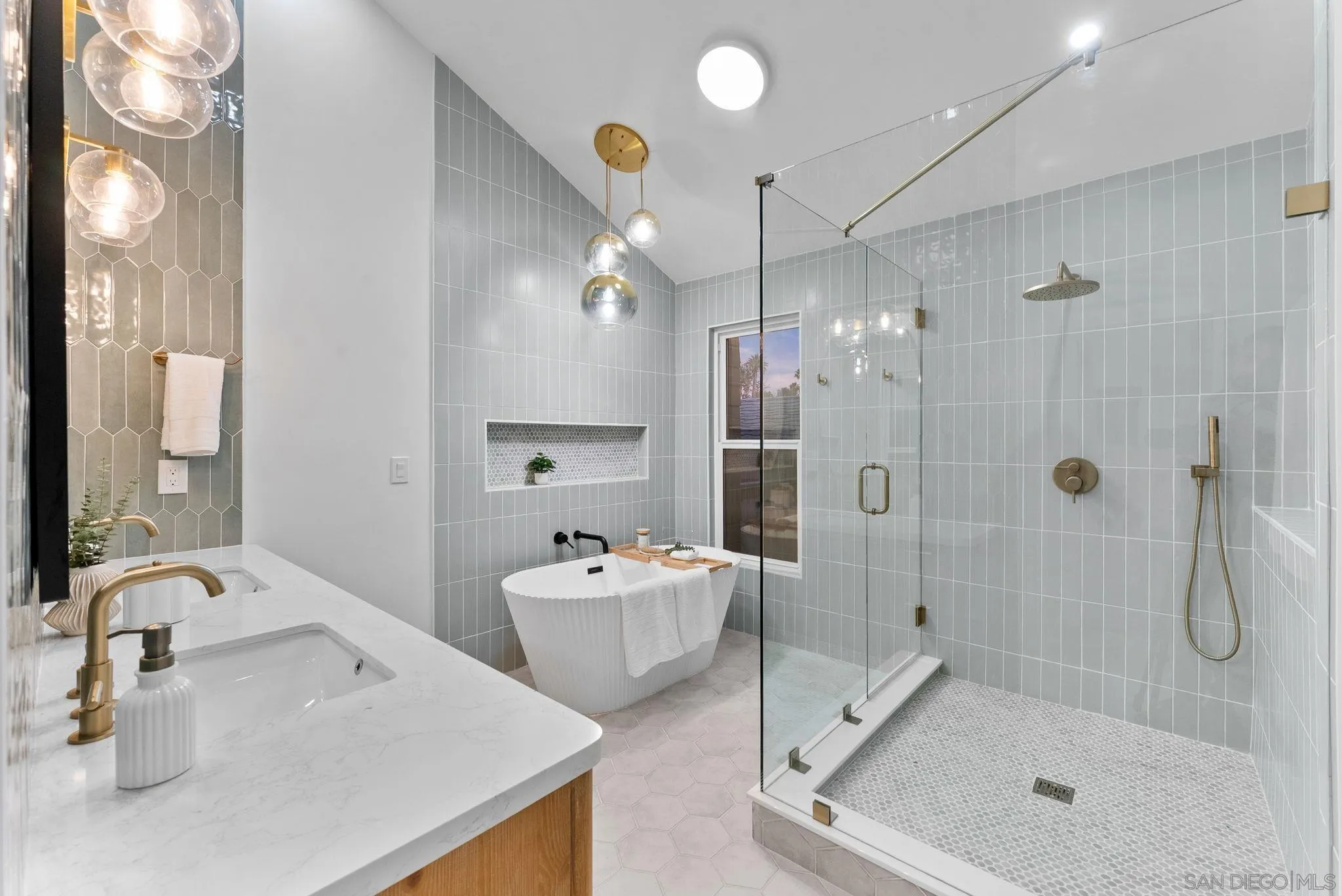 16048 Via Viajera Rancho Santa Fe, CA 92091 - Photo 22 of 46 a bathroom with a tub sink mirror and shower