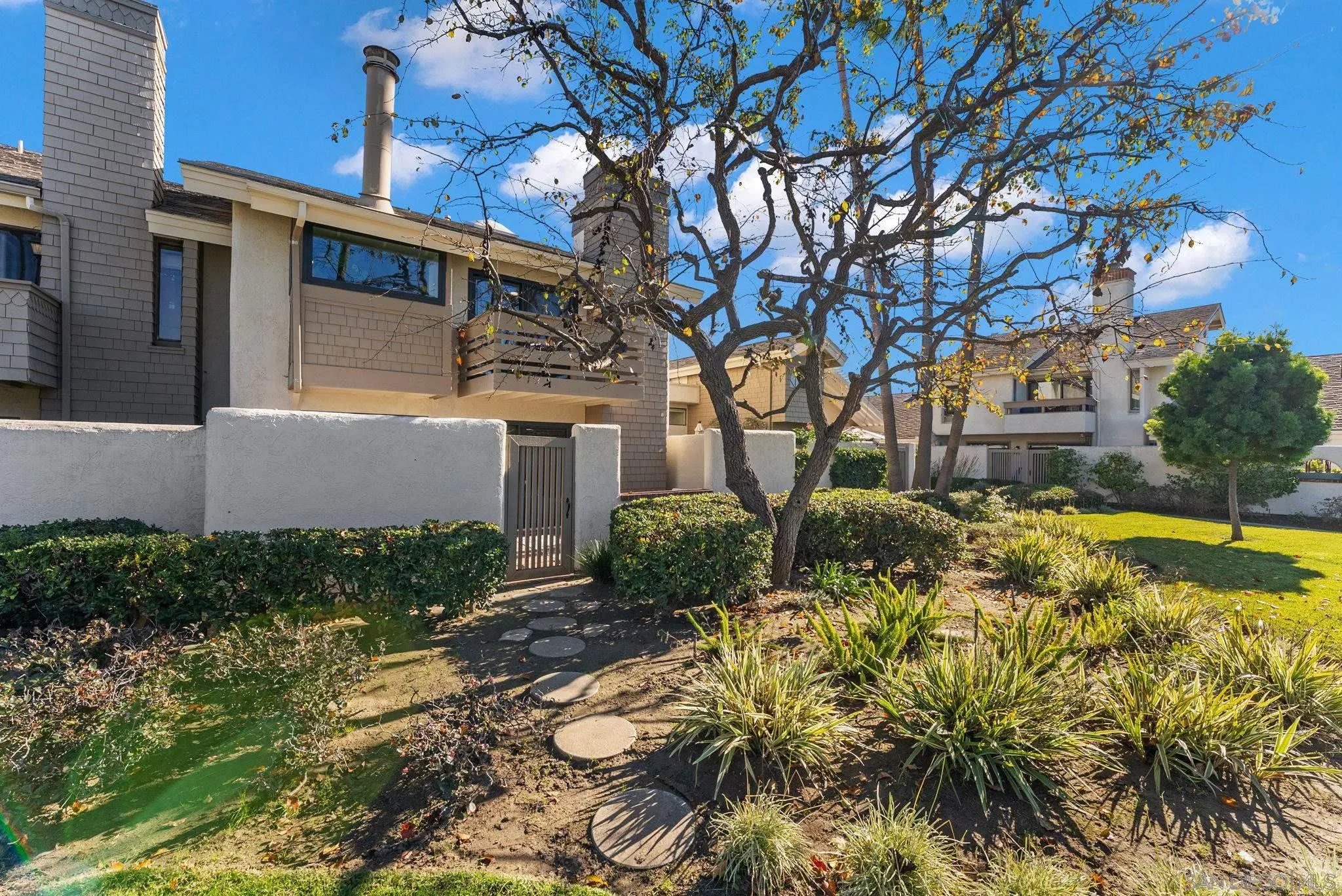 16048 Via Viajera Rancho Santa Fe, CA 92091 - Photo 36 of 46 a view of a yard with plants and large trees