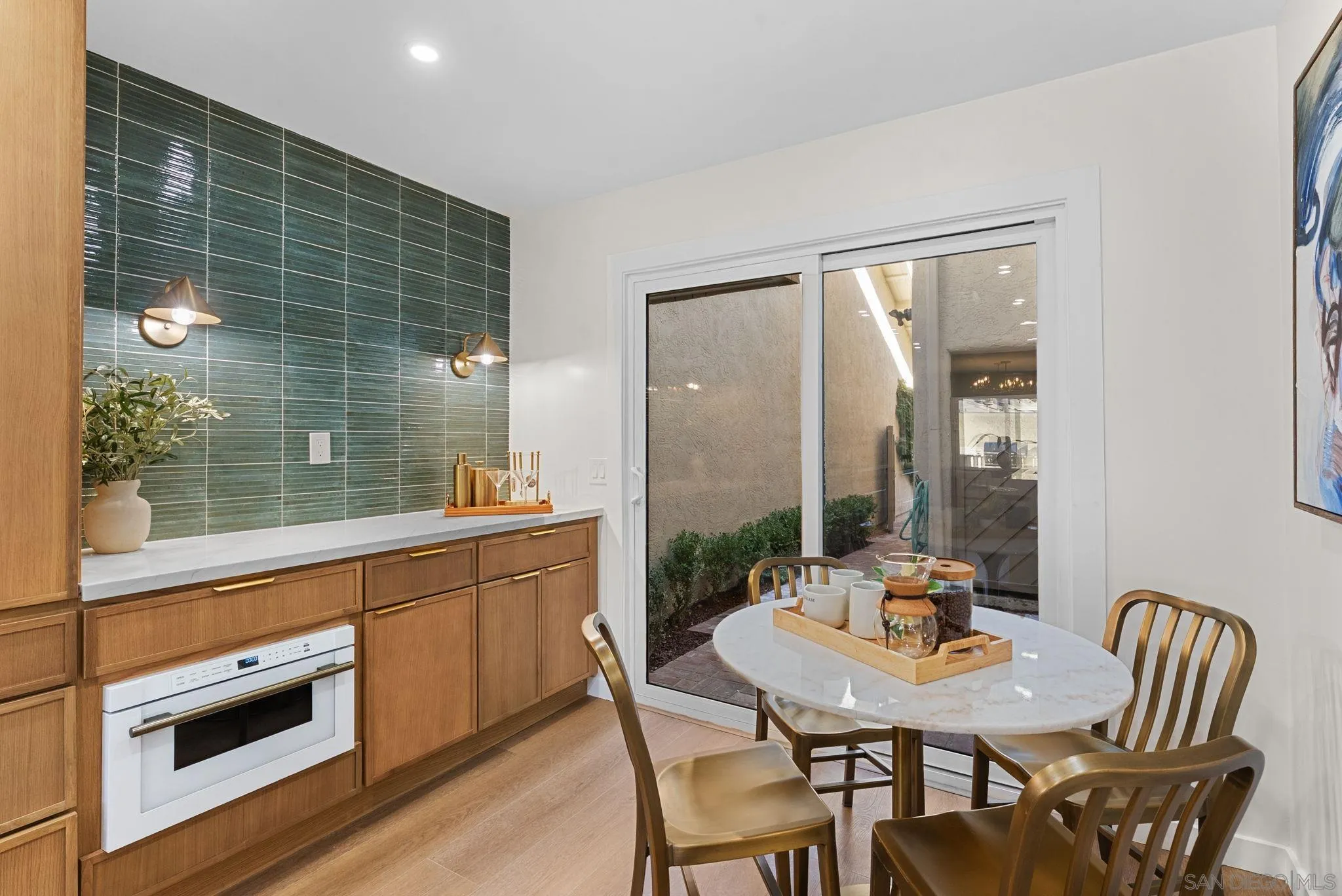 16048 Via Viajera Rancho Santa Fe, CA 92091 - Photo 4 of 46 a view of a dining room with furniture window and wooden floor