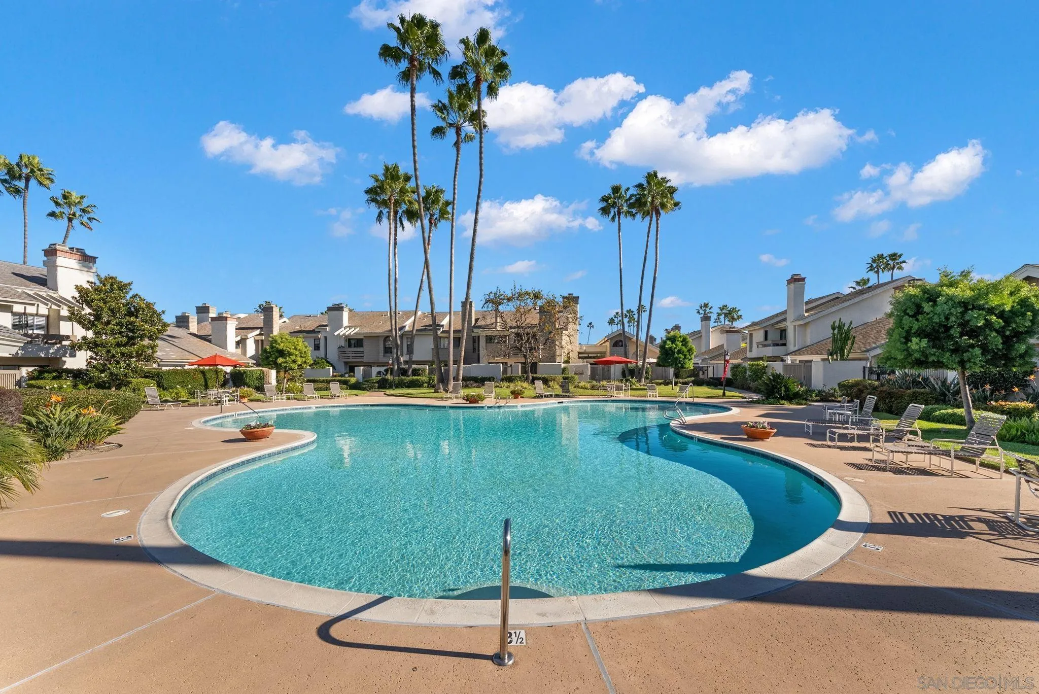 16048 Via Viajera Rancho Santa Fe, CA 92091 - Photo 43 of 46 a view of a swimming pool with a table and chairs