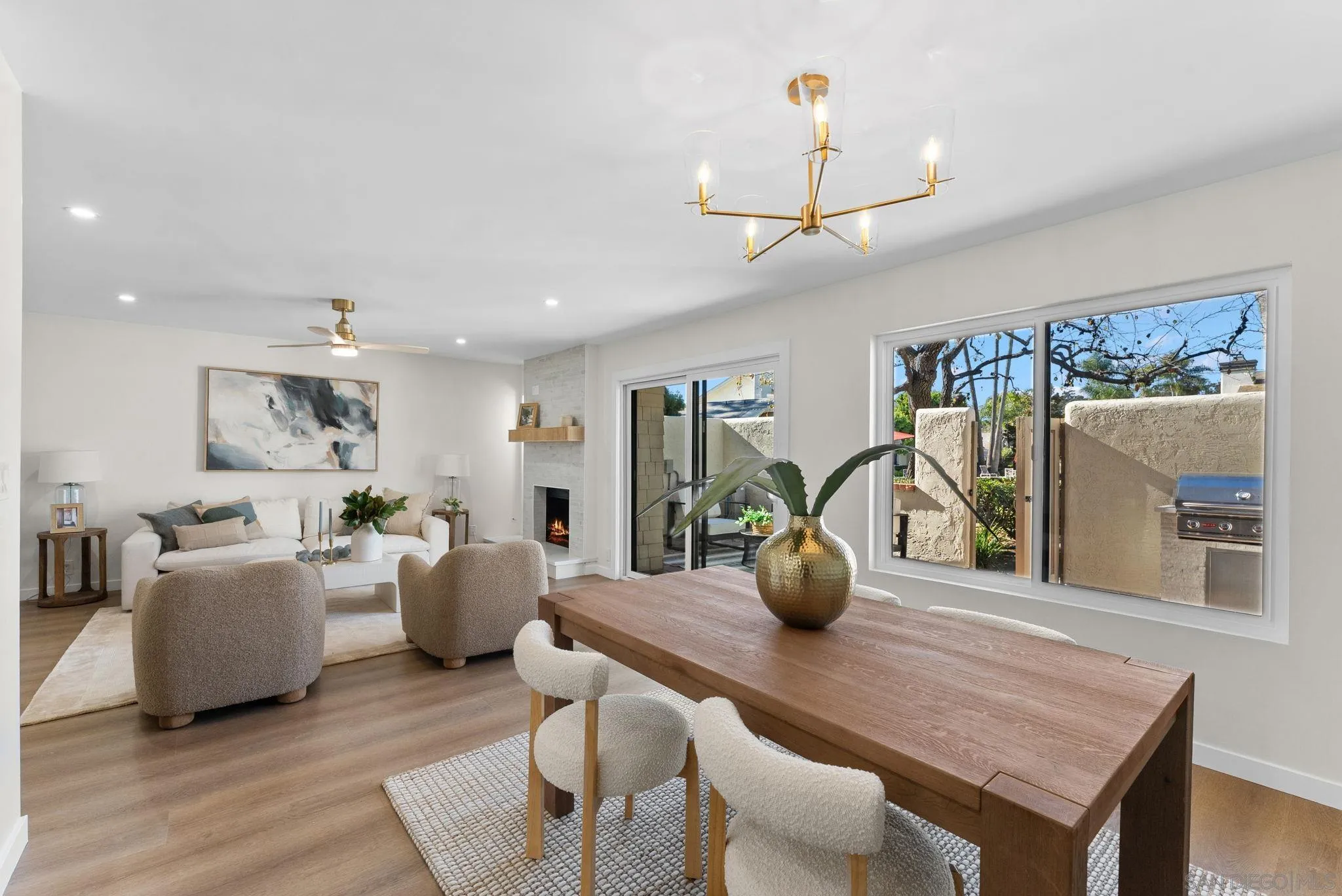 16048 Via Viajera Rancho Santa Fe, CA 92091 - Photo 6 of 46 a view of a dining room with furniture and wooden floor