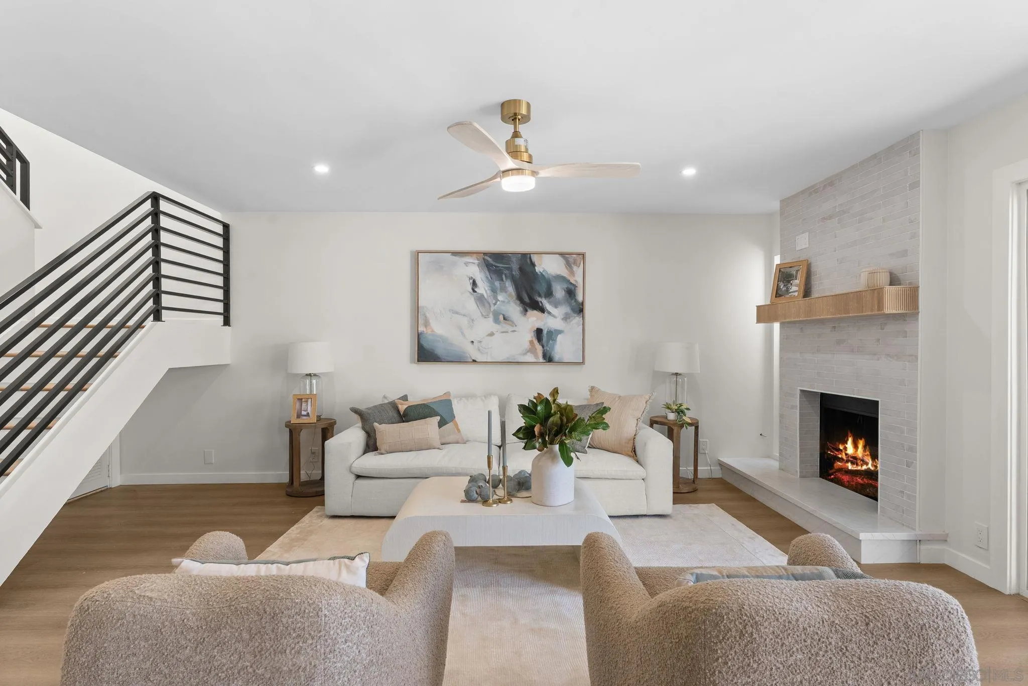 16048 Via Viajera Rancho Santa Fe, CA 92091 - Photo 9 of 46 a living room with furniture and a fireplace