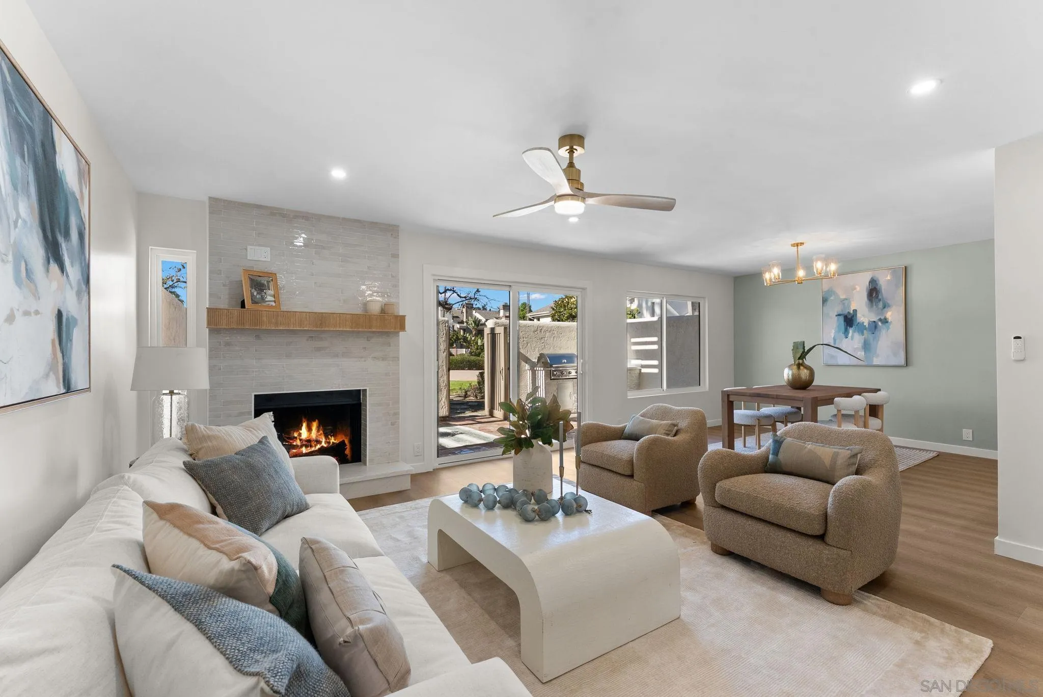 16048 Via Viajera Rancho Santa Fe, CA 92091 - Photo 10 of 46 a living room with furniture and a fireplace