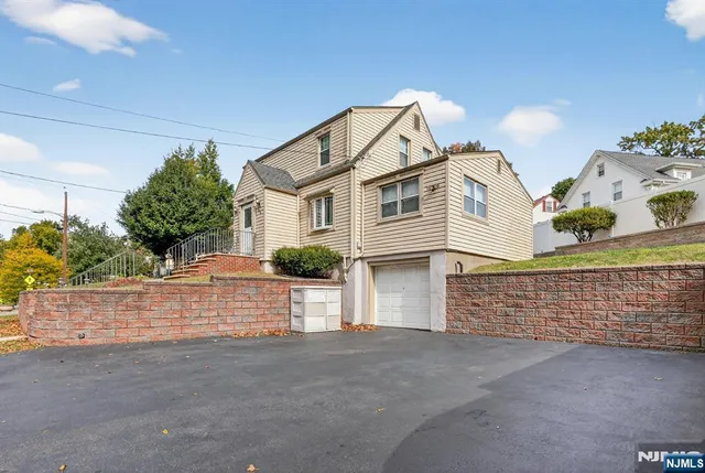a view of a house with a garage
