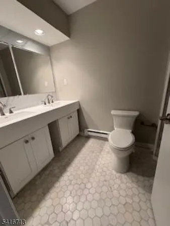 a bathroom with a sink and a toilet