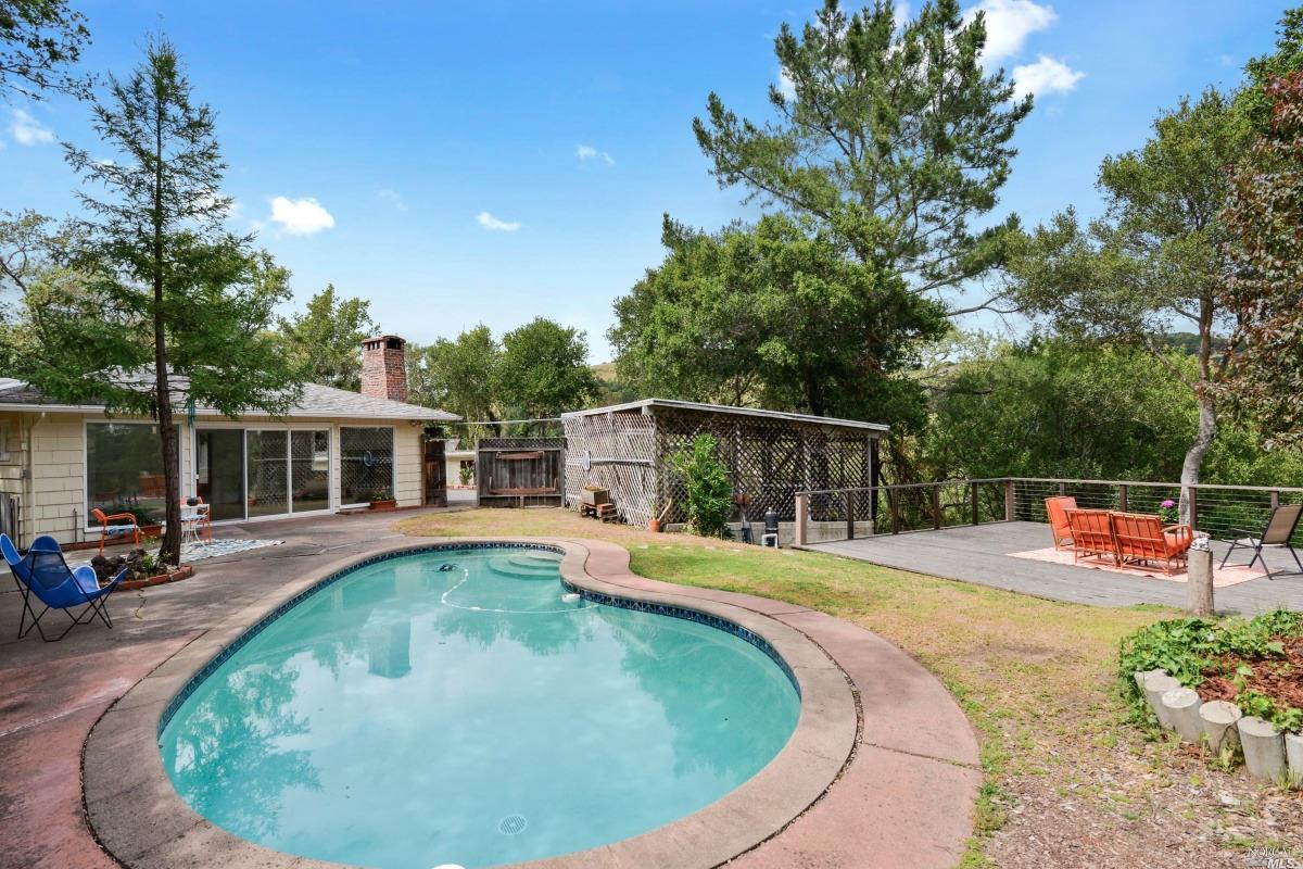 977 Butterfield Road San Anselmo, CA 94960 - Photo 1 of 1 swimming pool view with a seating space and garden view