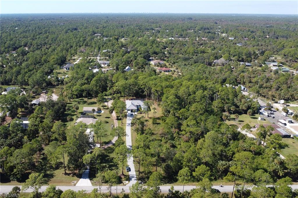 491 9th Street Southwest Naples, FL 34117 - Photo 37 of 49 an aerial view of residential house with outdoor space