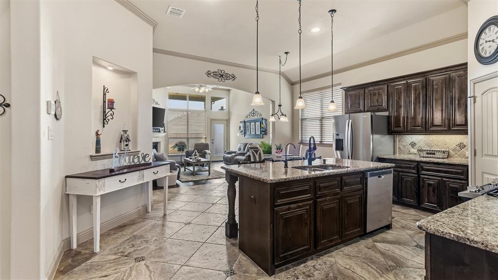 509 Alice Lane Fate, TX 75189 - Photo 5 of 36 Open kitchen with expansive room around the island