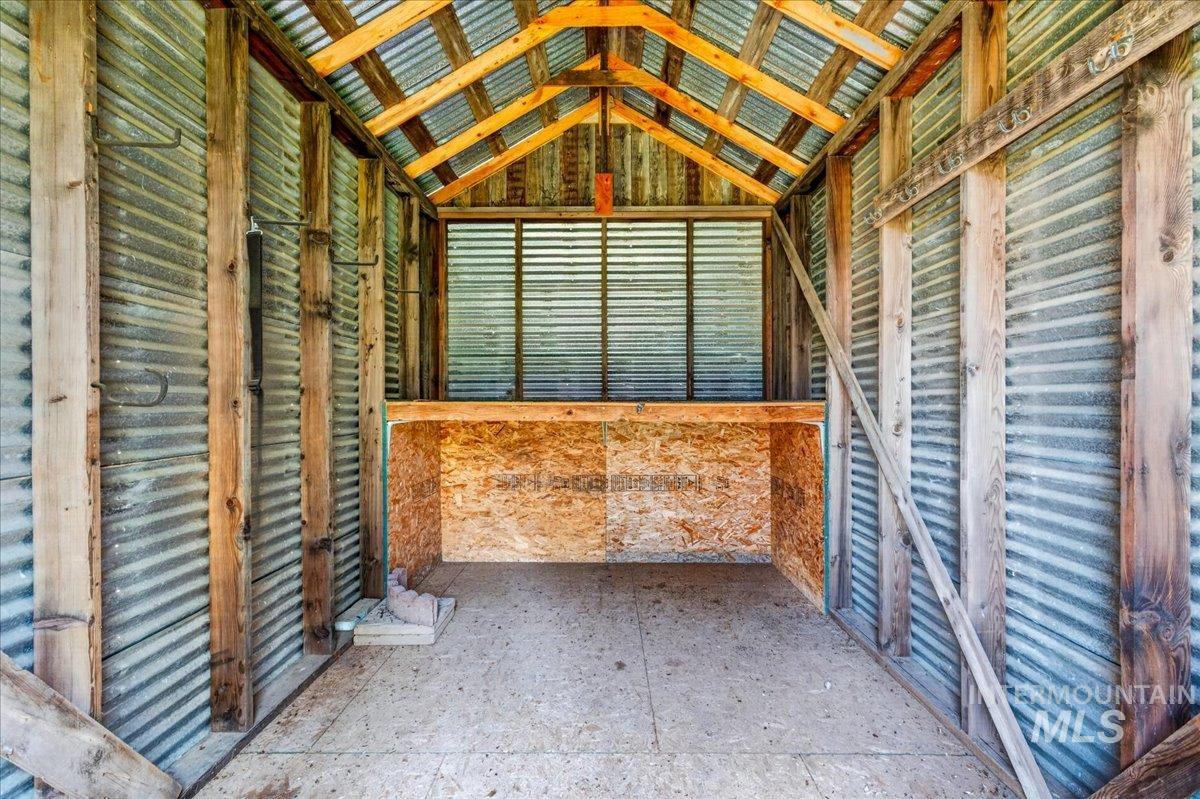1071 Reynolds Road Princeton, ID 83857 - Photo 27 of 43 Utility structure featuring corrugated metal walls and exposed wooden framing
