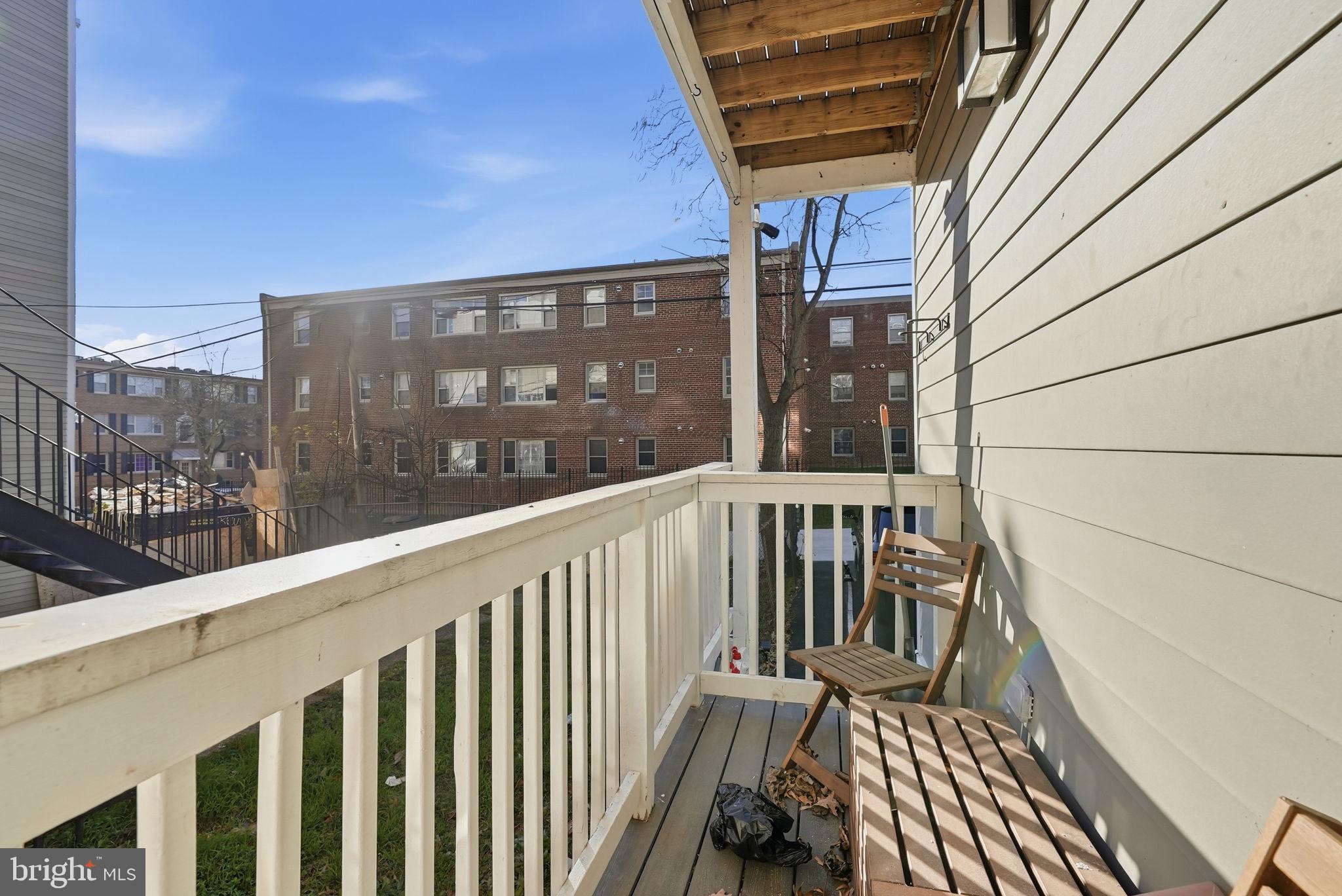 2109 M Street Northeast, Unit 5 Washington, DC 20002 - Photo 10 of 11 a view of balcony with wooden floor