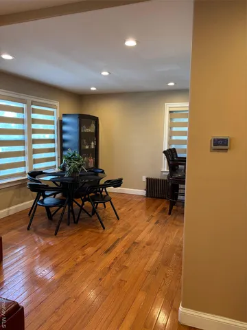 a workspace with furniture and wooden floor