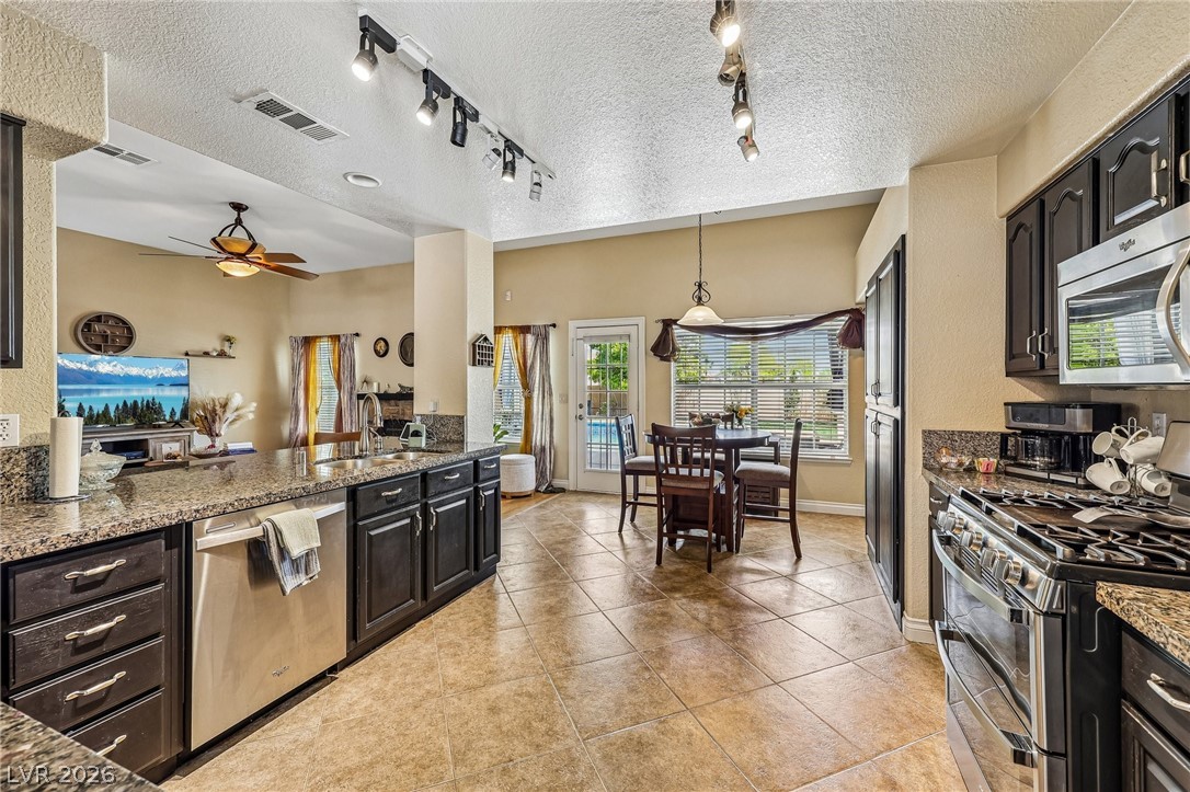 5236 Saranac Road Las Vegas, NV 89130 - Photo 18 of 52 All stainless appliances stay with home