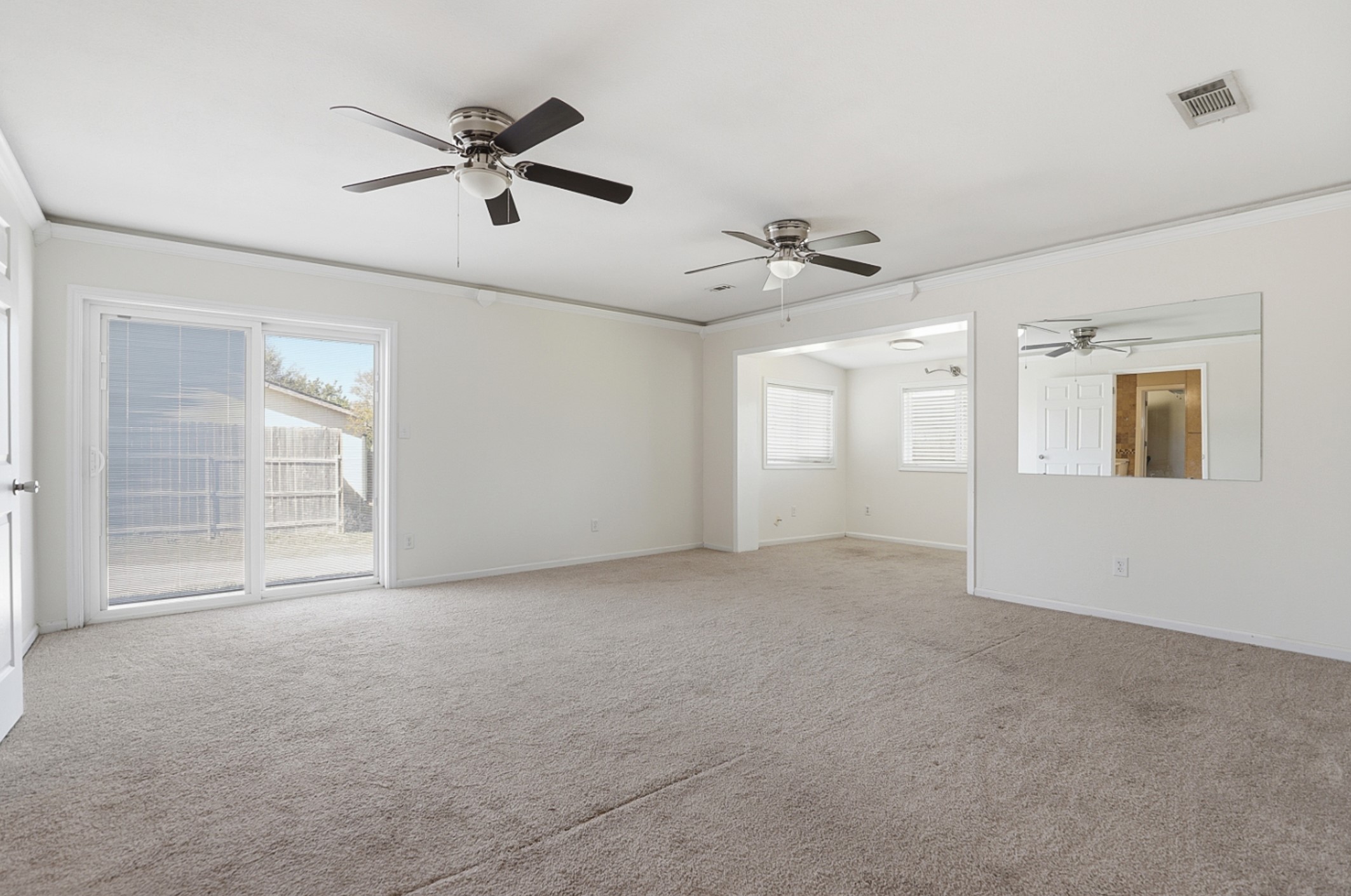 128 Skyview Terrace Leander, TX 78641 - Photo 13 of 23 Primary bedroom featuring carpet, ornamental molding and ceiling fan