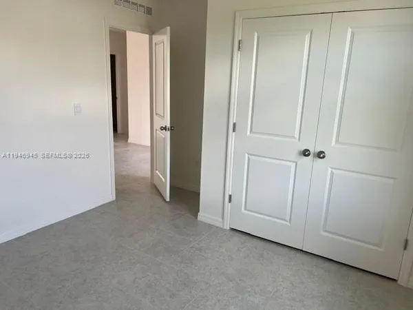 an empty room with a door