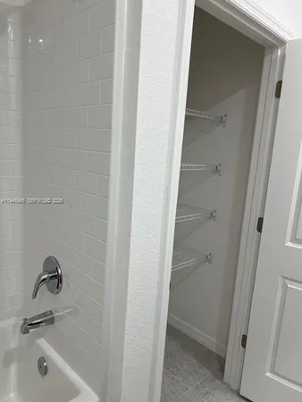 a bathroom with a bathtub