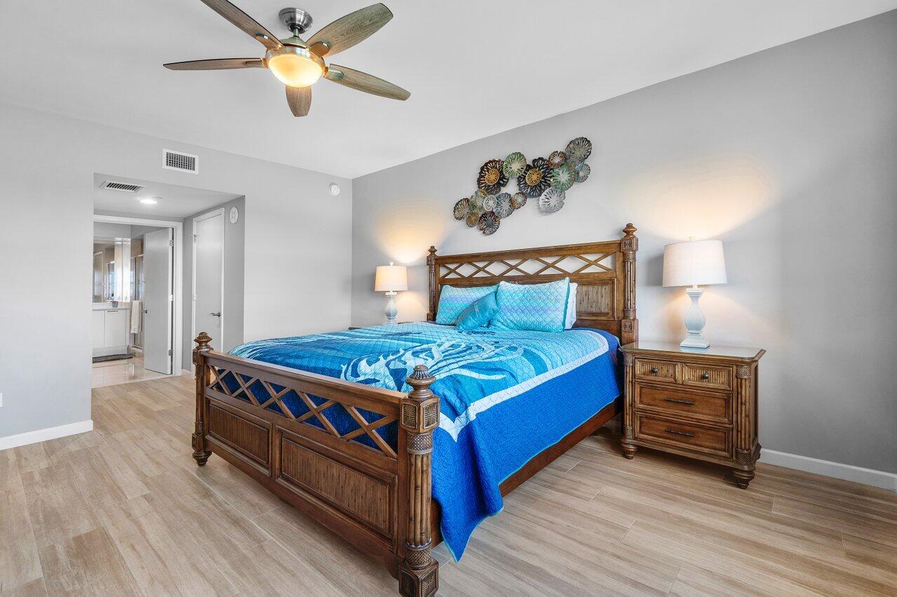 2640 Lake Shore Drive, Unit 711 Riviera Beach, FL 33404 - Photo 25 of 59 spacious primary bedroom