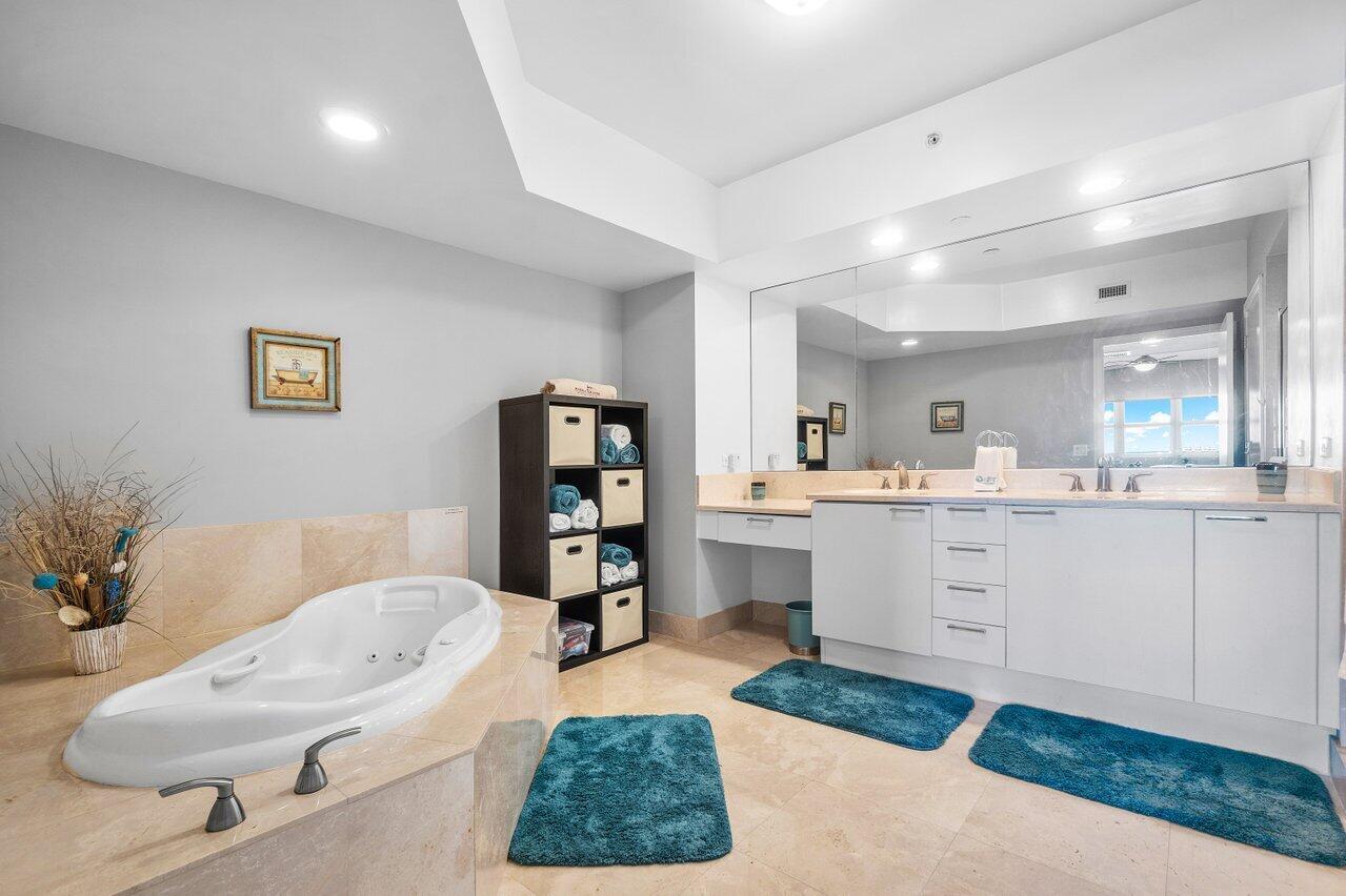 2640 Lake Shore Drive, Unit 711 Riviera Beach, FL 33404 - Photo 27 of 59 Primary with dual sinks