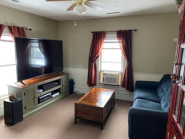 986 Main Street Antioch, IL 60002 - Photo 17 of 24 a living room with furniture and a flat screen tv