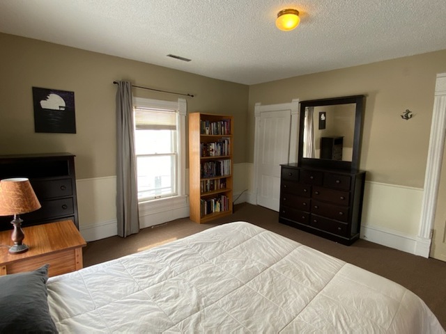 986 Main Street Antioch, IL 60002 - Photo 23 of 24 a bedroom with a bed and a television