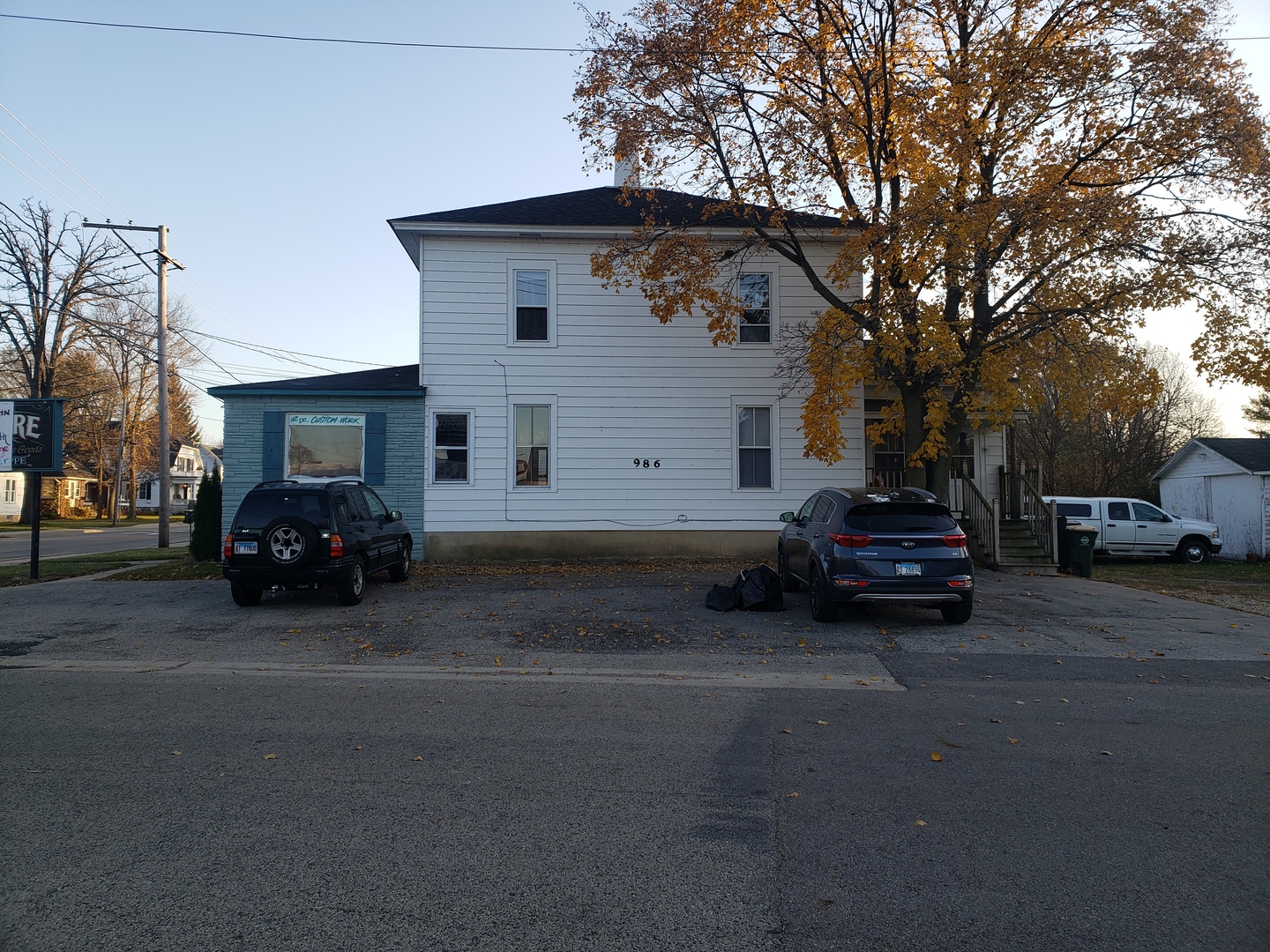 986 Main Street Antioch, IL 60002 - Photo 5 of 24 a view of a car parked in front of a house