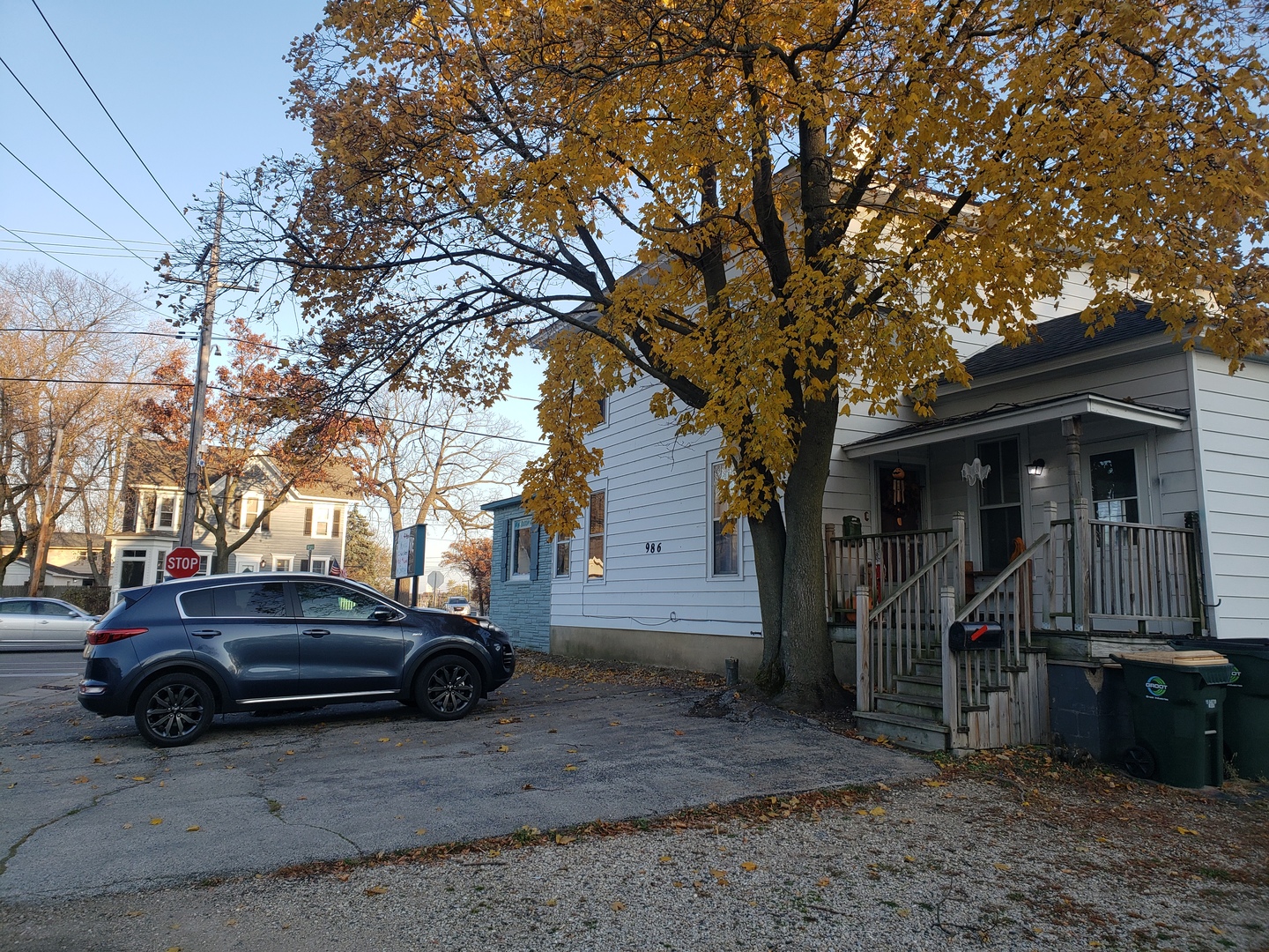 986 Main Street Antioch, IL 60002 - Photo 6 of 24 a view of a car park in front of house