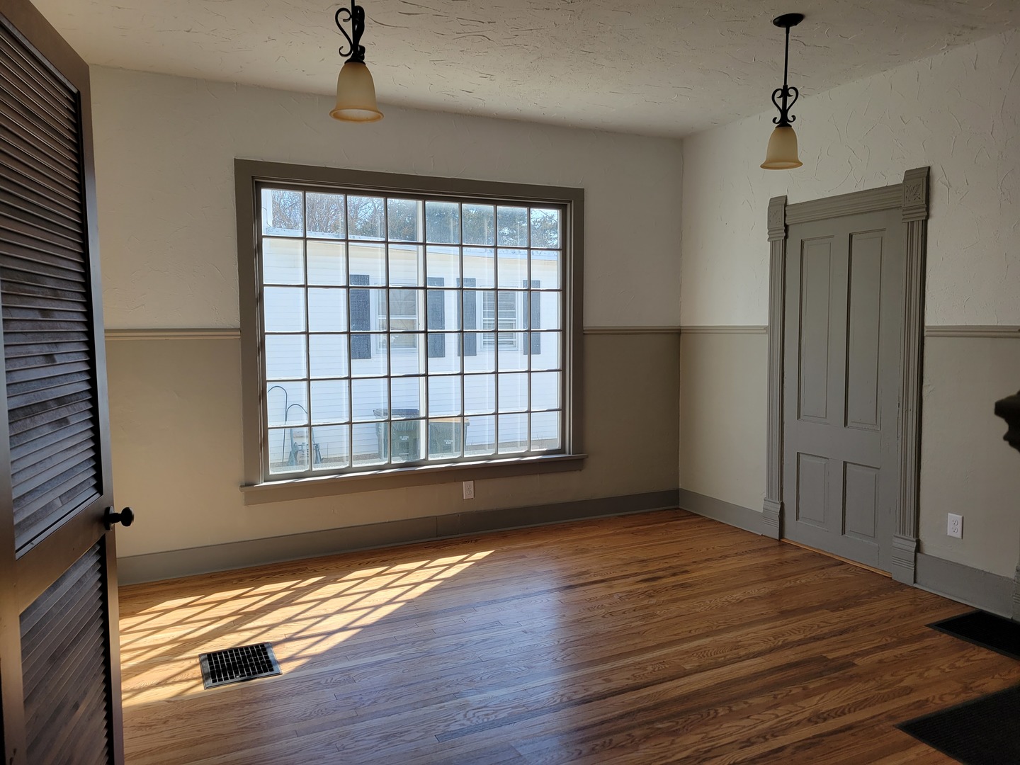 986 Main Street Antioch, IL 60002 - Photo 10 of 24 a view of empty room with wooden floor and fan