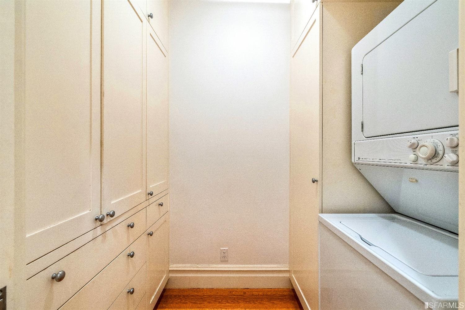 1925 Gough Street, Unit 11 San Francisco, CA 94109 - Photo 30 of 46 a bathroom with a sink and a mirror