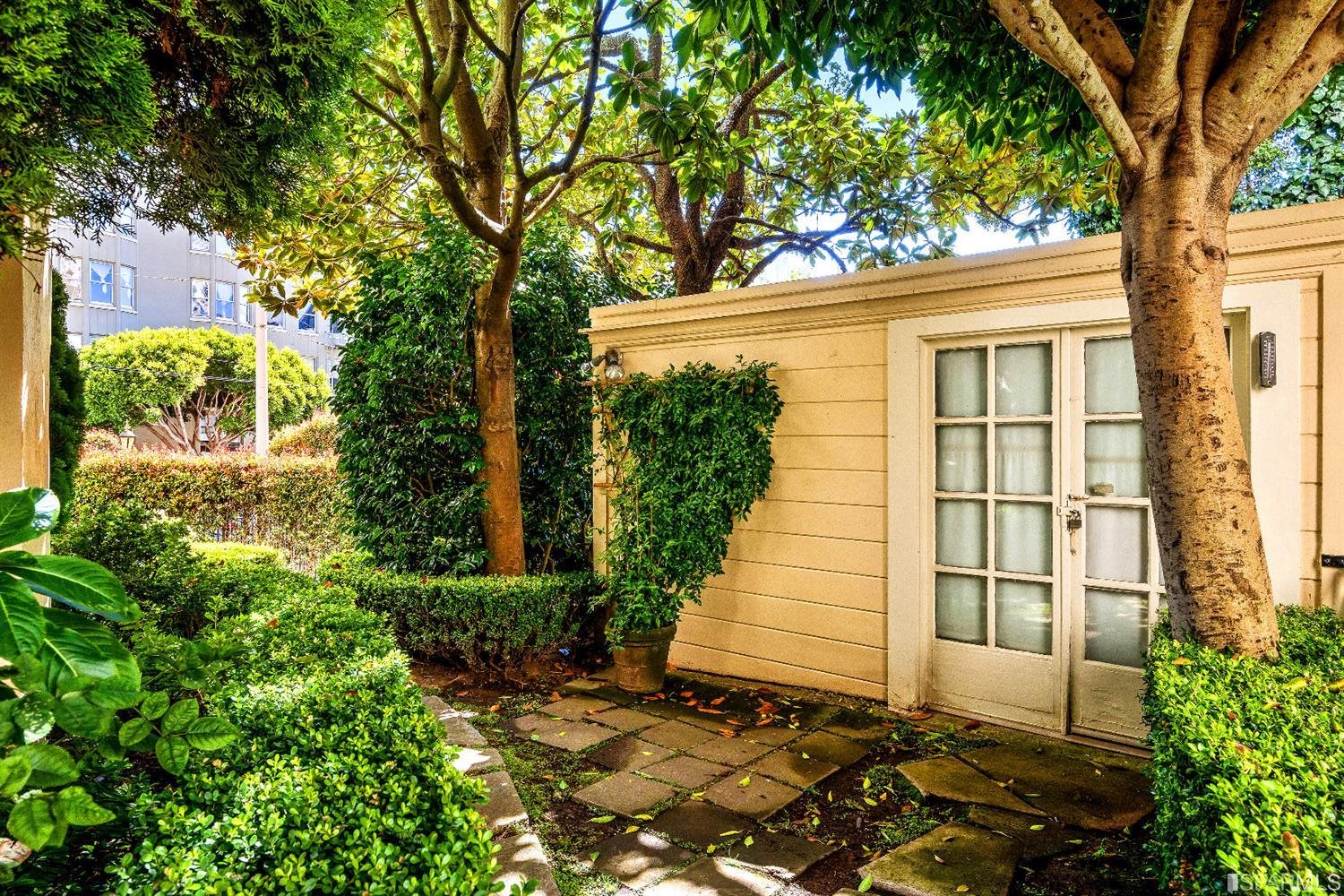1925 Gough Street, Unit 11 San Francisco, CA 94109 - Photo 34 of 46 front view of a house with a tree