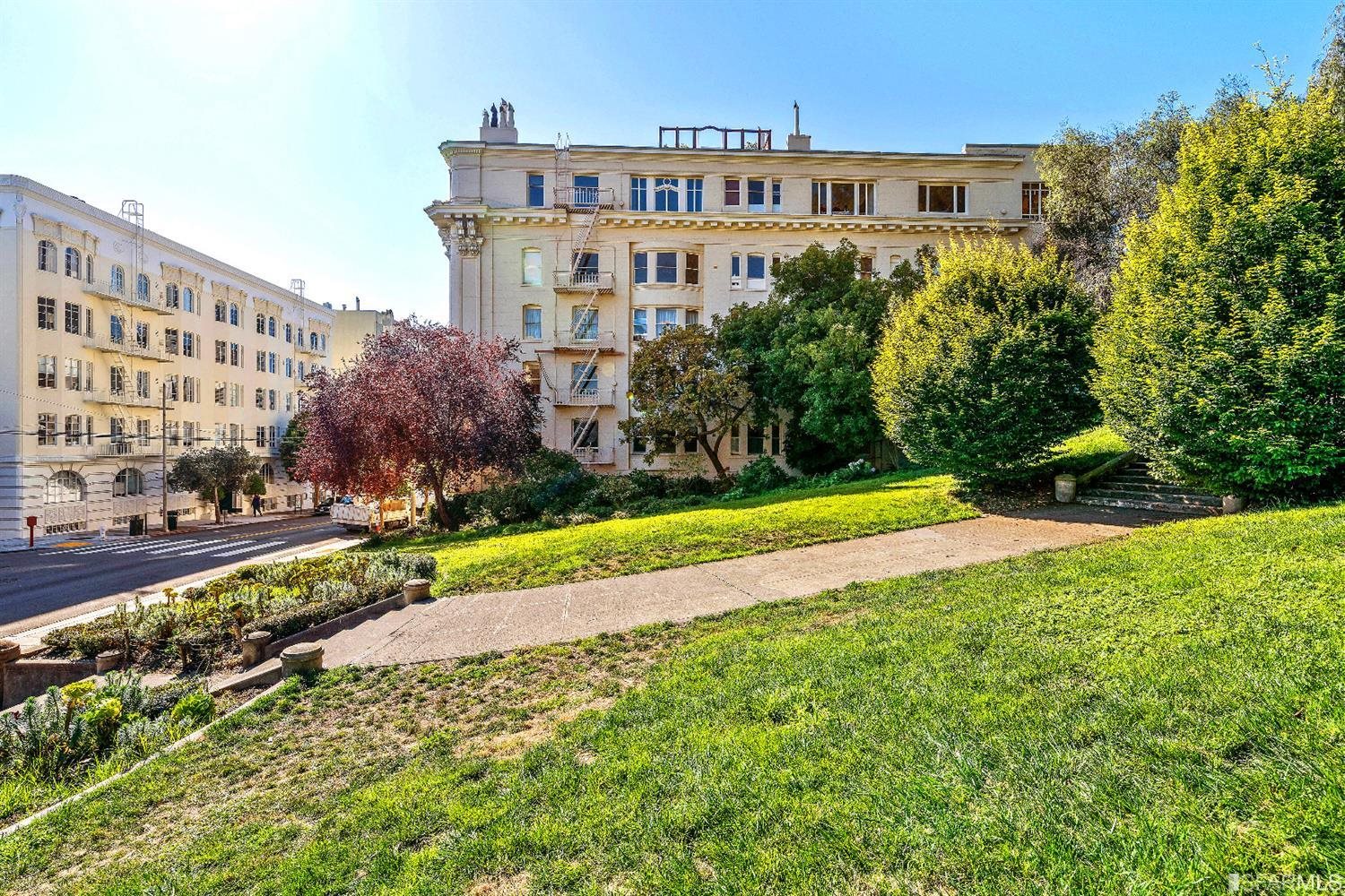 1925 Gough Street, Unit 11 San Francisco, CA 94109 - Photo 36 of 46 a view of a house with a yard and plants