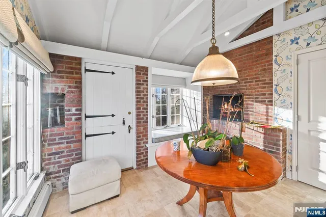 a kitchen with stainless steel appliances granite countertop a stove and cabinets