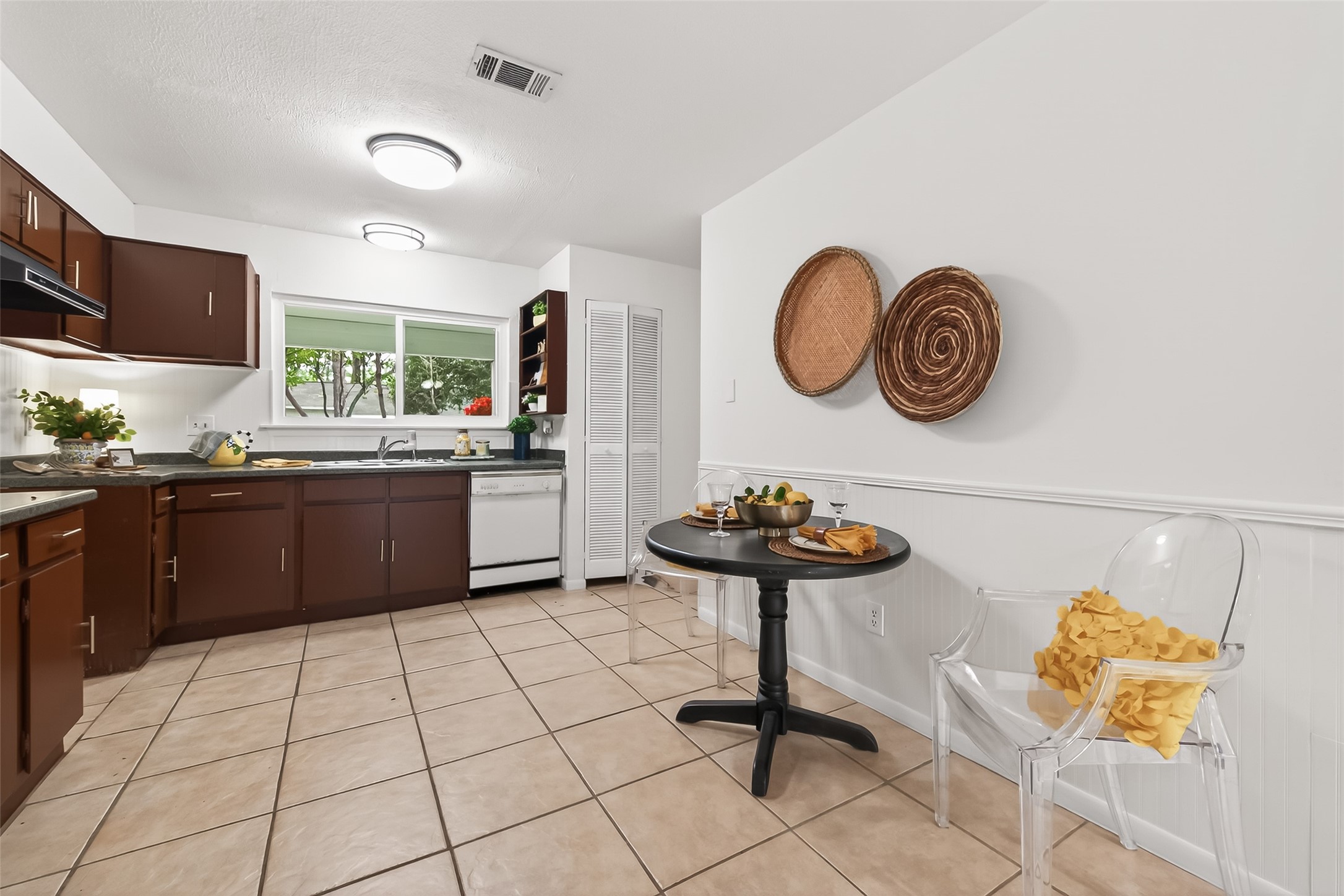 1 Laurel Oak Place Spring, TX 77380 - Photo 13 of 39 a kitchen with a sink cabinets and window