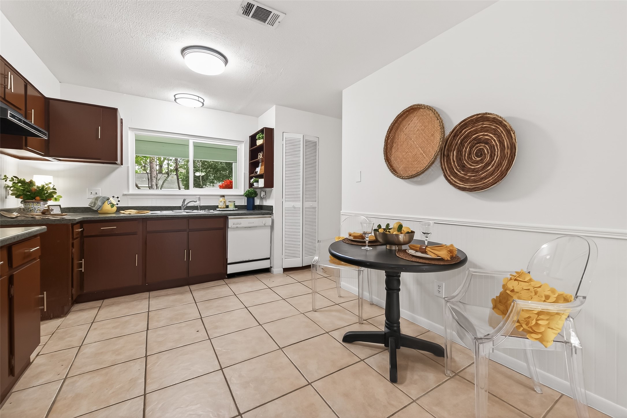 1 Laurel Oak Place Spring, TX 77380 - Photo 16 of 39 a kitchen with a sink and a stove