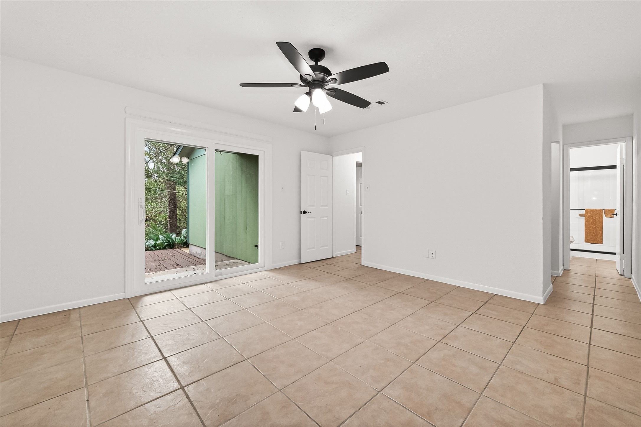 1 Laurel Oak Place Spring, TX 77380 - Photo 30 of 39 an empty room to ceiling fan and entryway