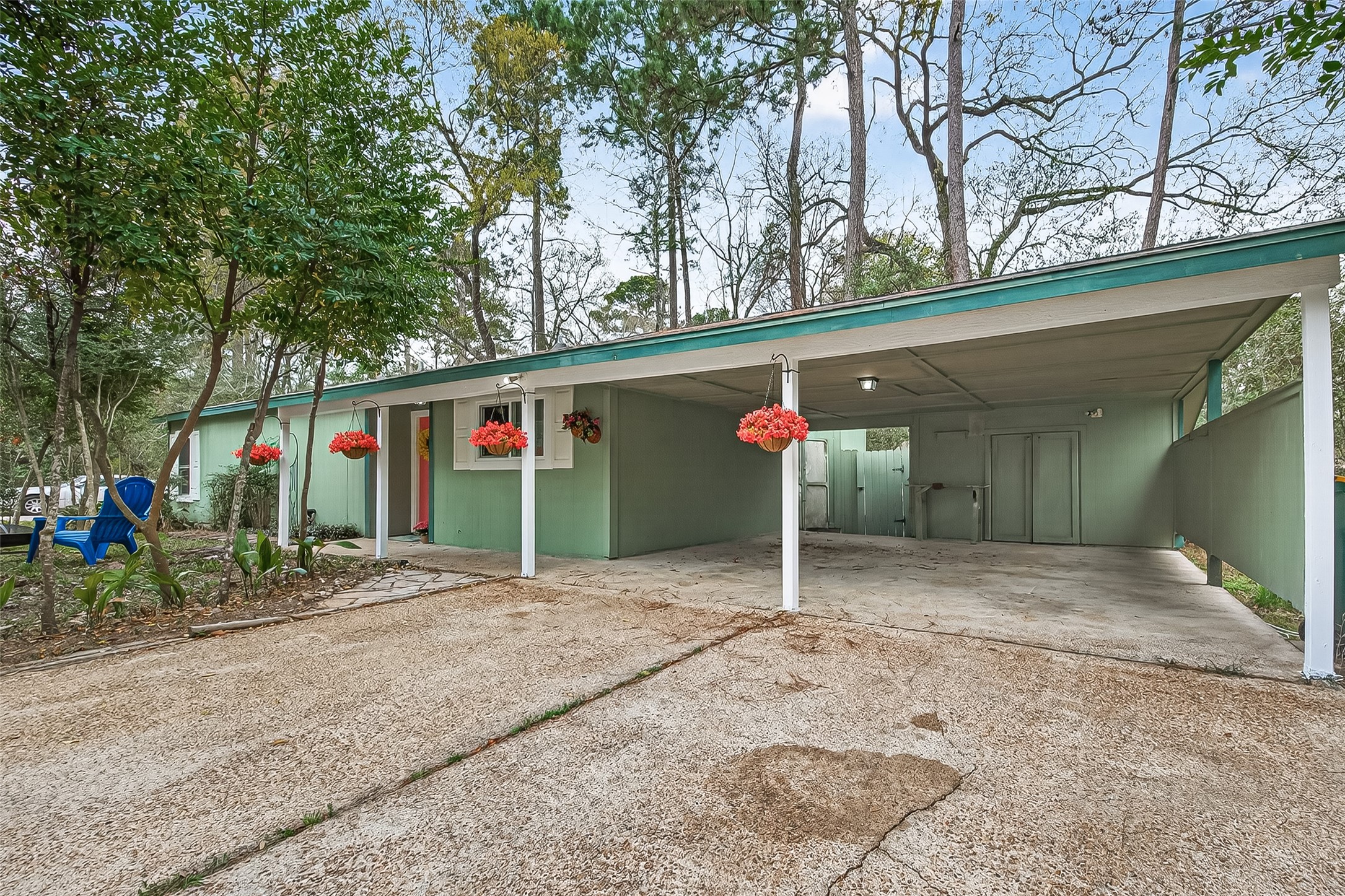 1 Laurel Oak Place Spring, TX 77380 - Photo 39 of 39 a front view of a house with a yard and garage
