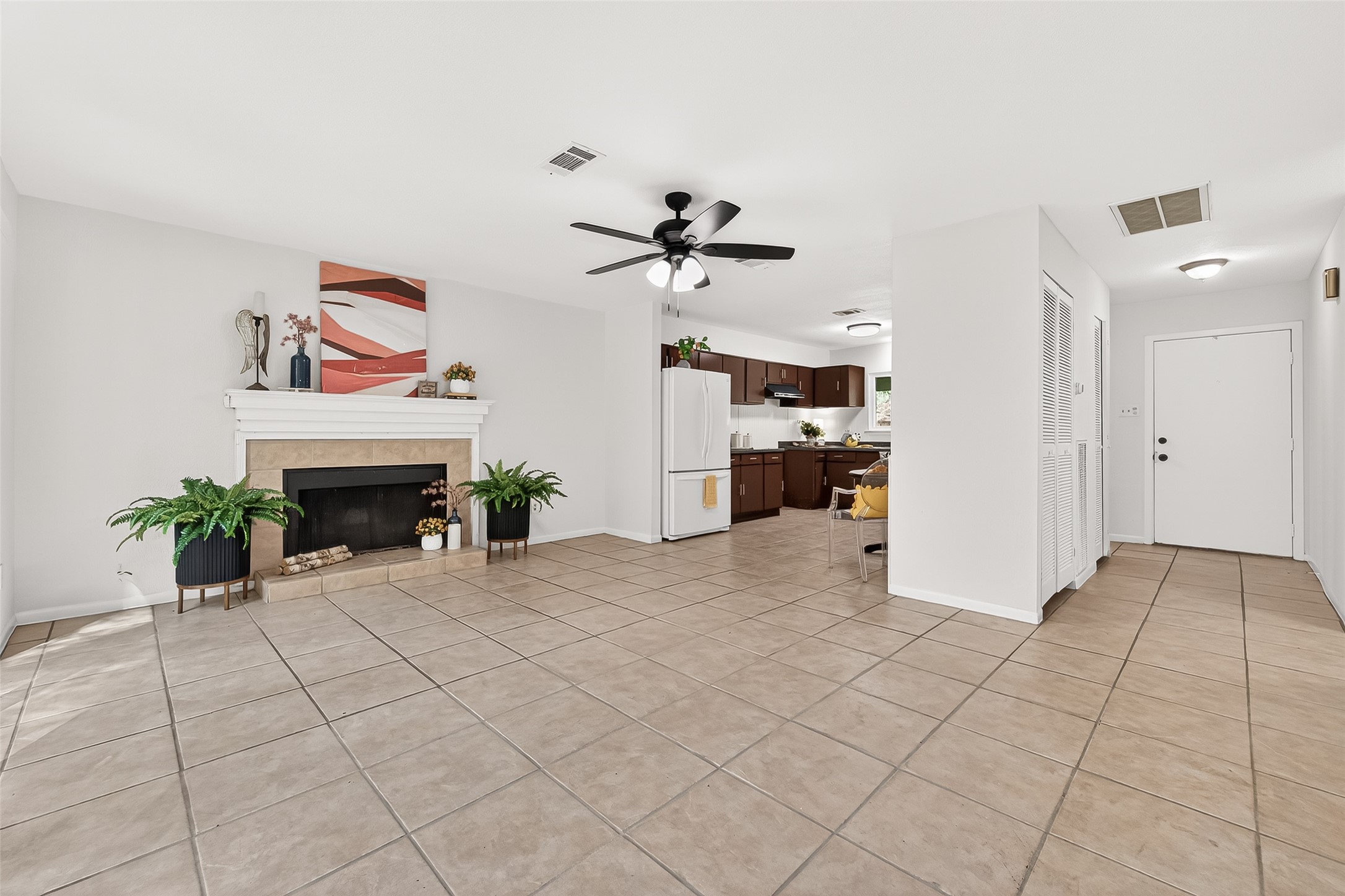 1 Laurel Oak Place Spring, TX 77380 - Photo 8 of 39 a view of a livingroom with furniture and a fireplace