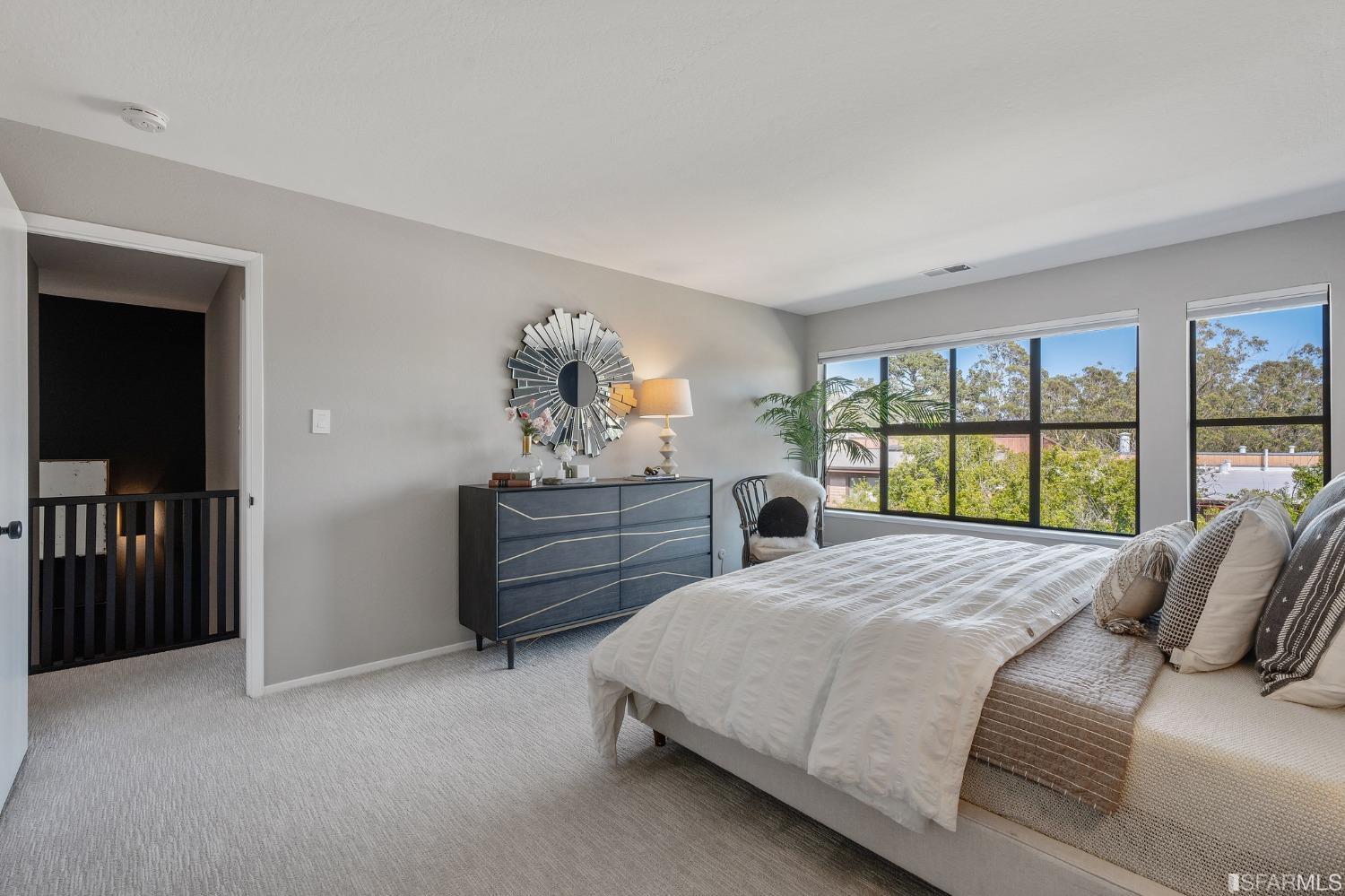 47 Malta Drive San Francisco, CA 94131 - Photo 21 of 40 a bedroom with a bed and a window