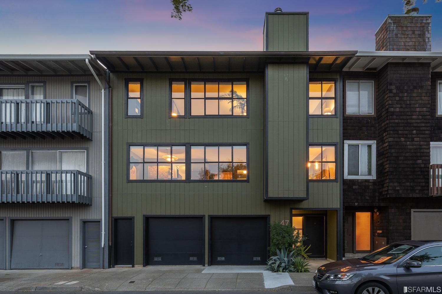 47 Malta Drive San Francisco, CA 94131 - Photo 37 of 40 a couple of cars parked in front of a building