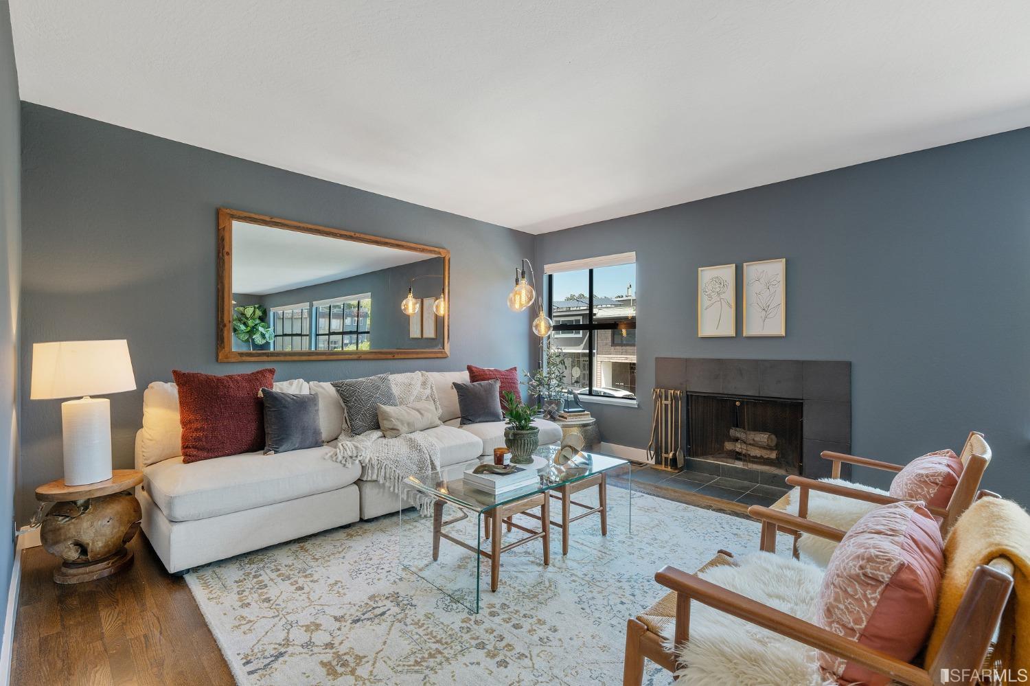 47 Malta Drive San Francisco, CA 94131 - Photo 6 of 40 a living room with furniture and a fireplace