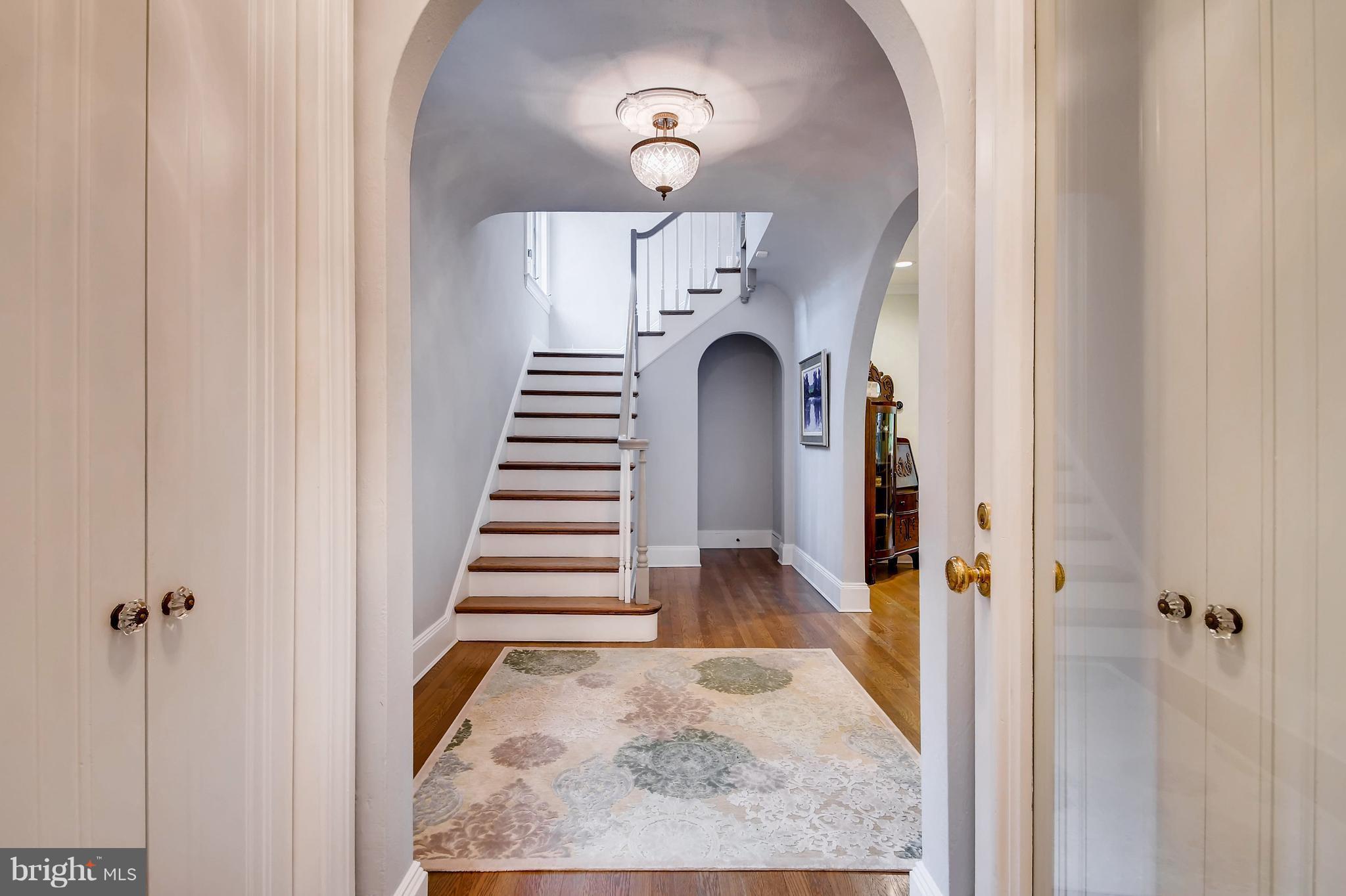 204 Witherspoon Road Baltimore, MD 21212 - Photo 3 of 30 a view of a hallway with wooden floor and entryway