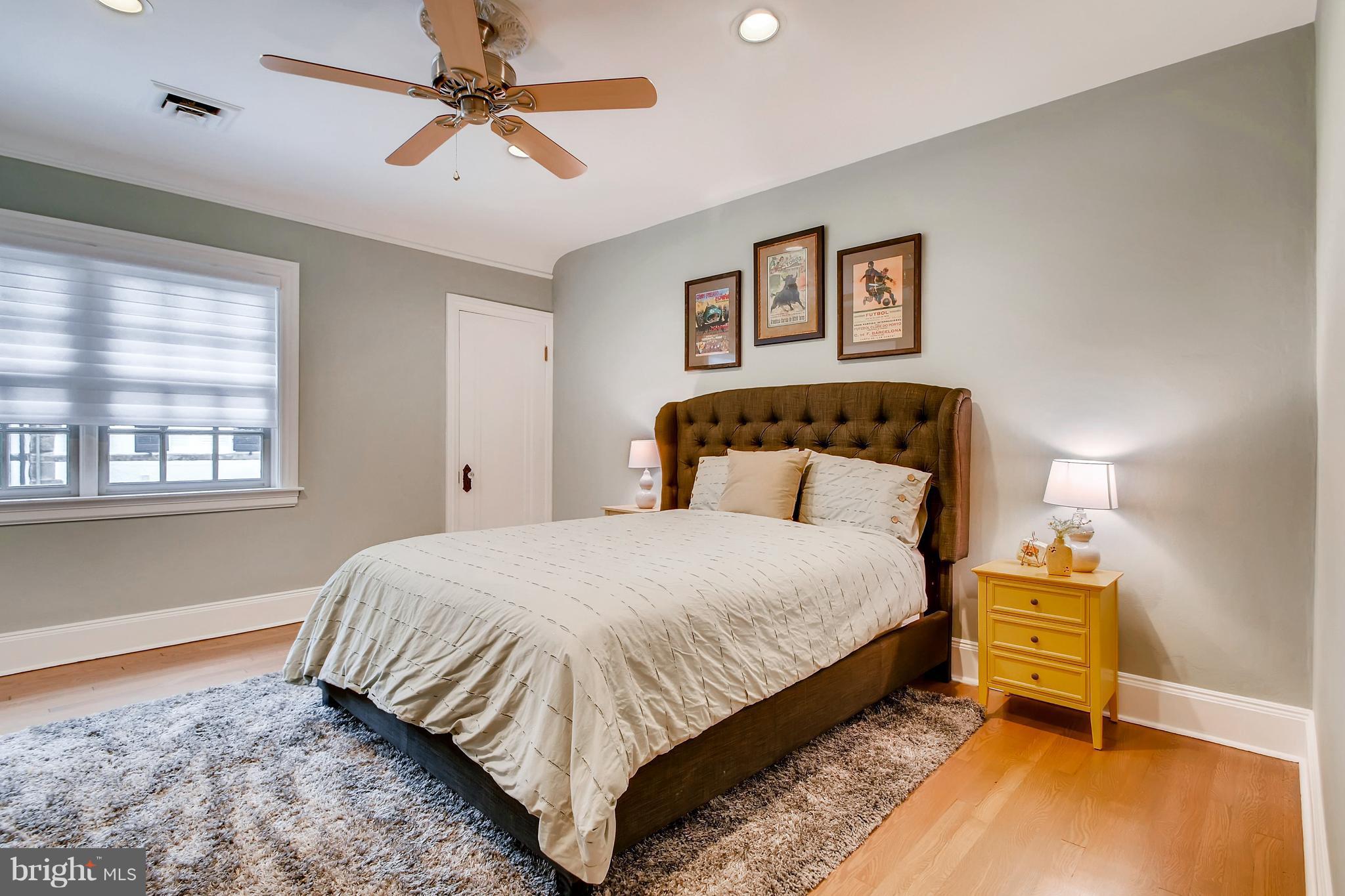 204 Witherspoon Road Baltimore, MD 21212 - Photo 24 of 30 a bedroom with a bed and a window