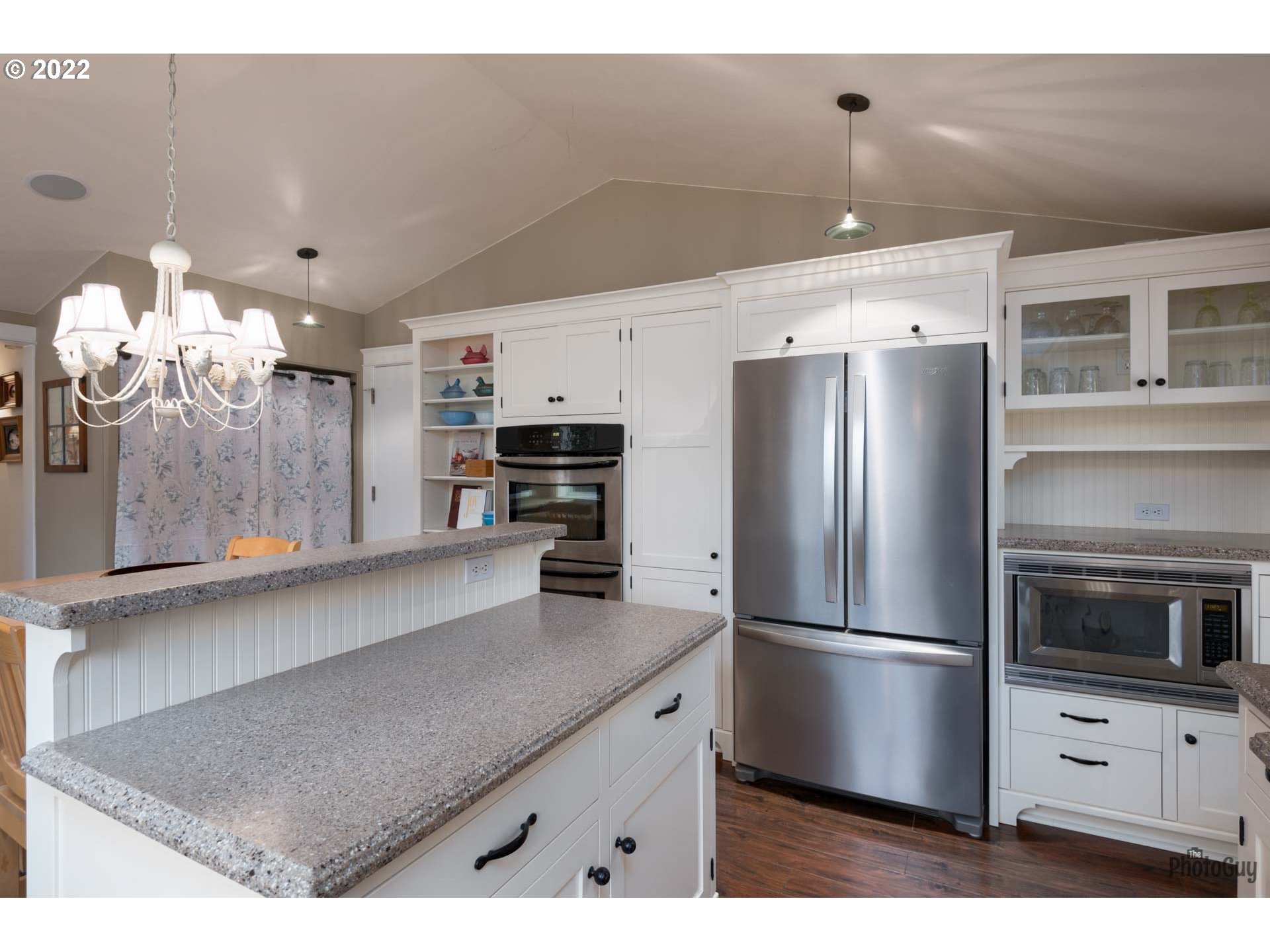2027 Monterey Lane Eugene, OR 97401 - Photo 14 of 32 a kitchen with stainless steel appliances a refrigerator and a stove top oven